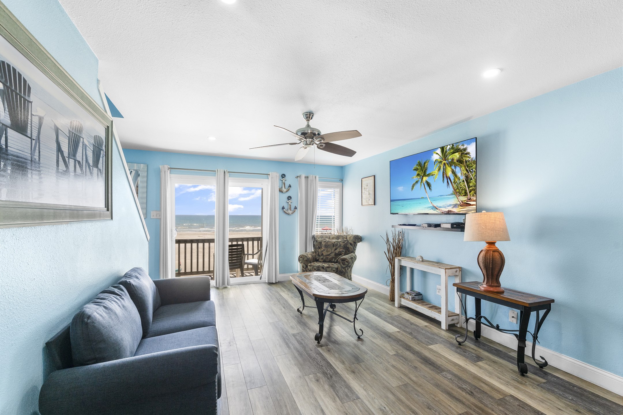 Beautiful beachfront views from the living area while relaxing on the couch and watching the flat screen TV