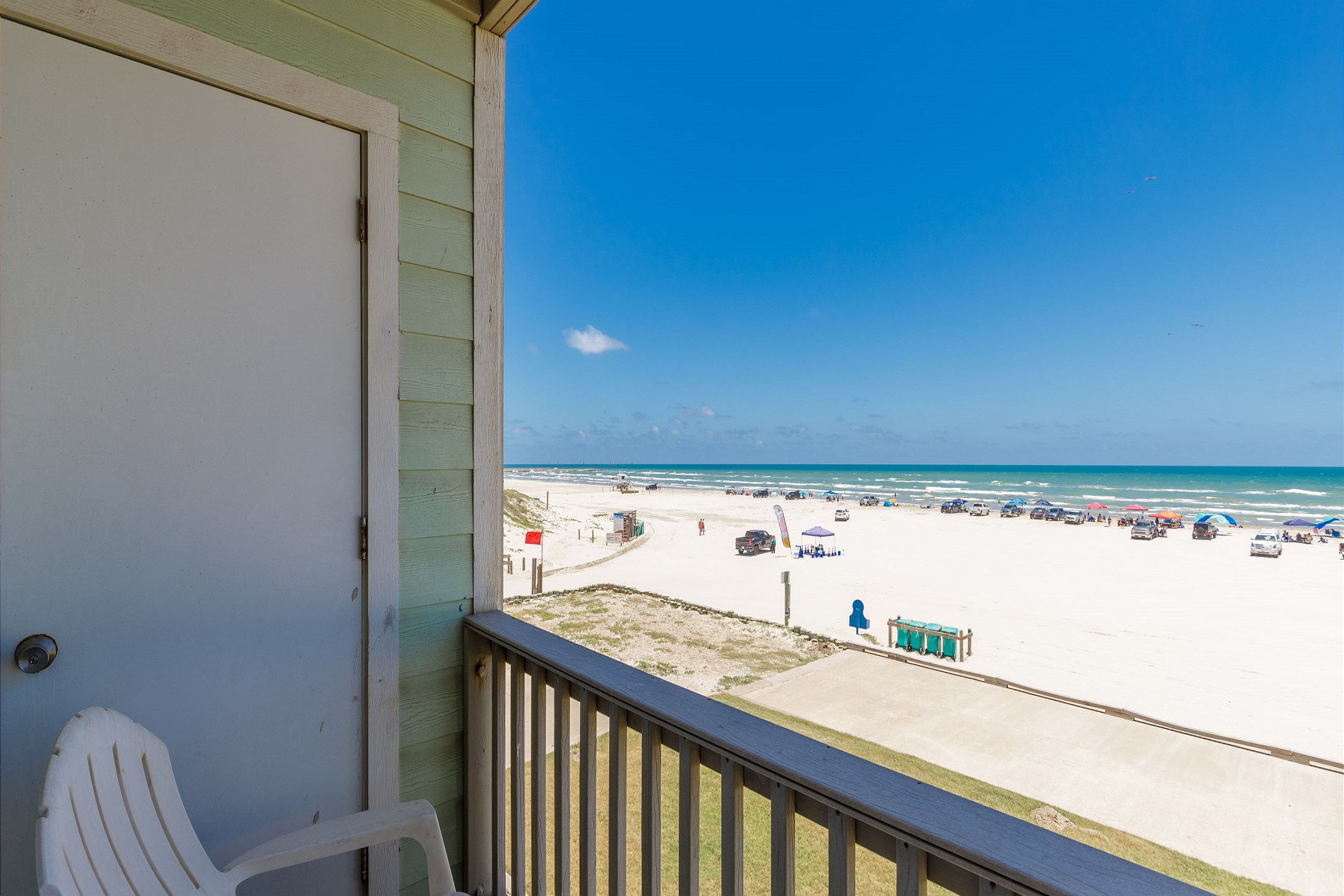 Living area balcony with comfy seating to relax and enjoy the Texas breeze 