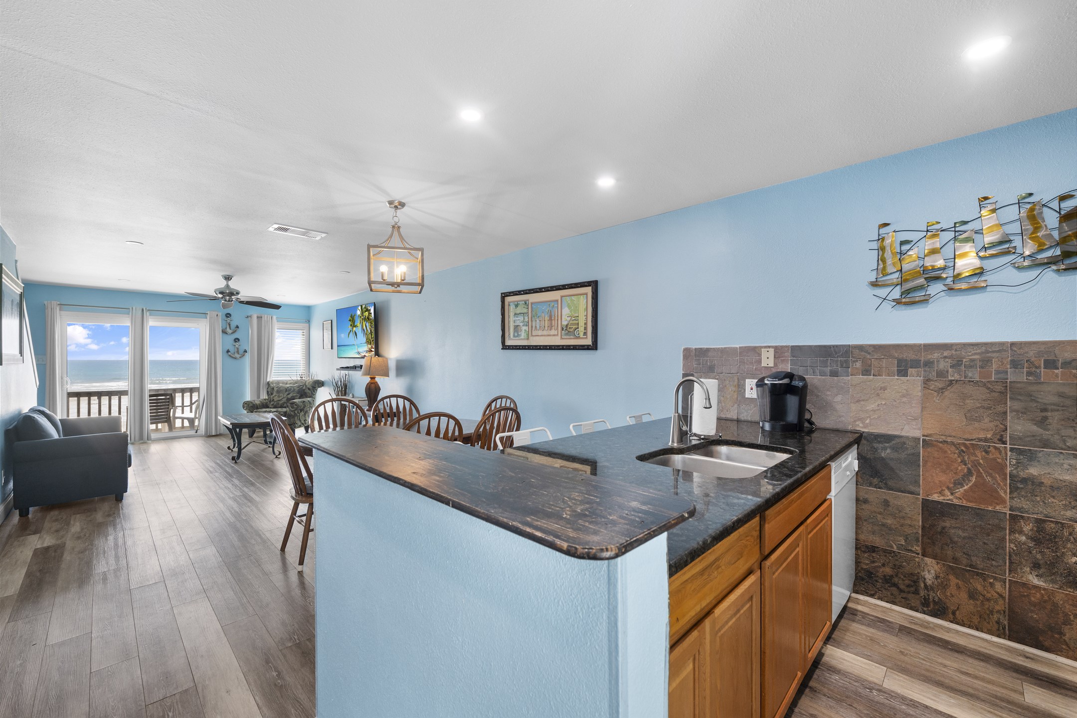 Whether you're cooking, dining, and hanging out in the living room...beach views for everyone