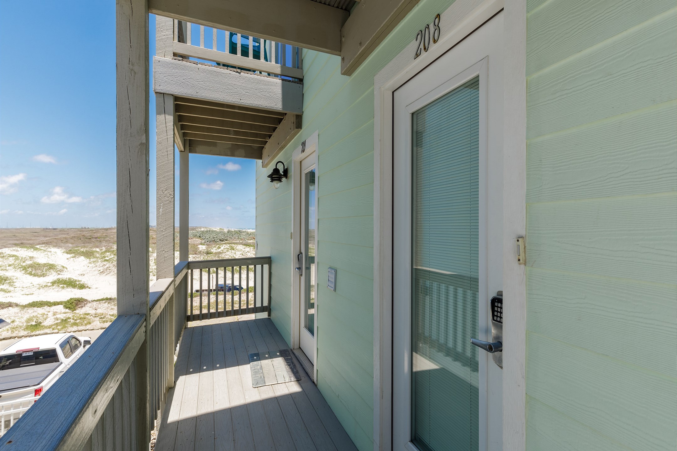 Main entrance, #208 with coded lock for extra security 