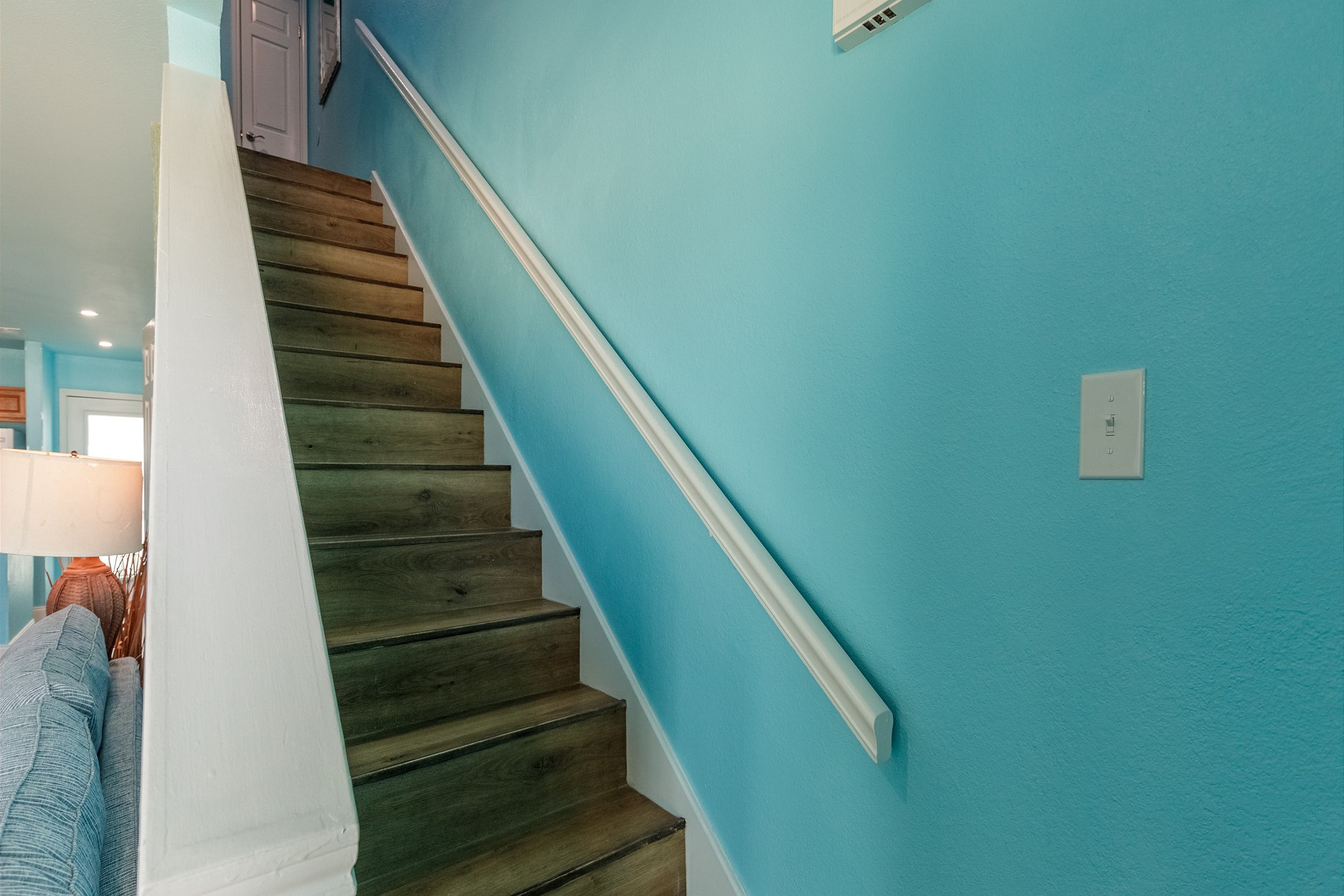 Stairs leading to second floor bedrooms 