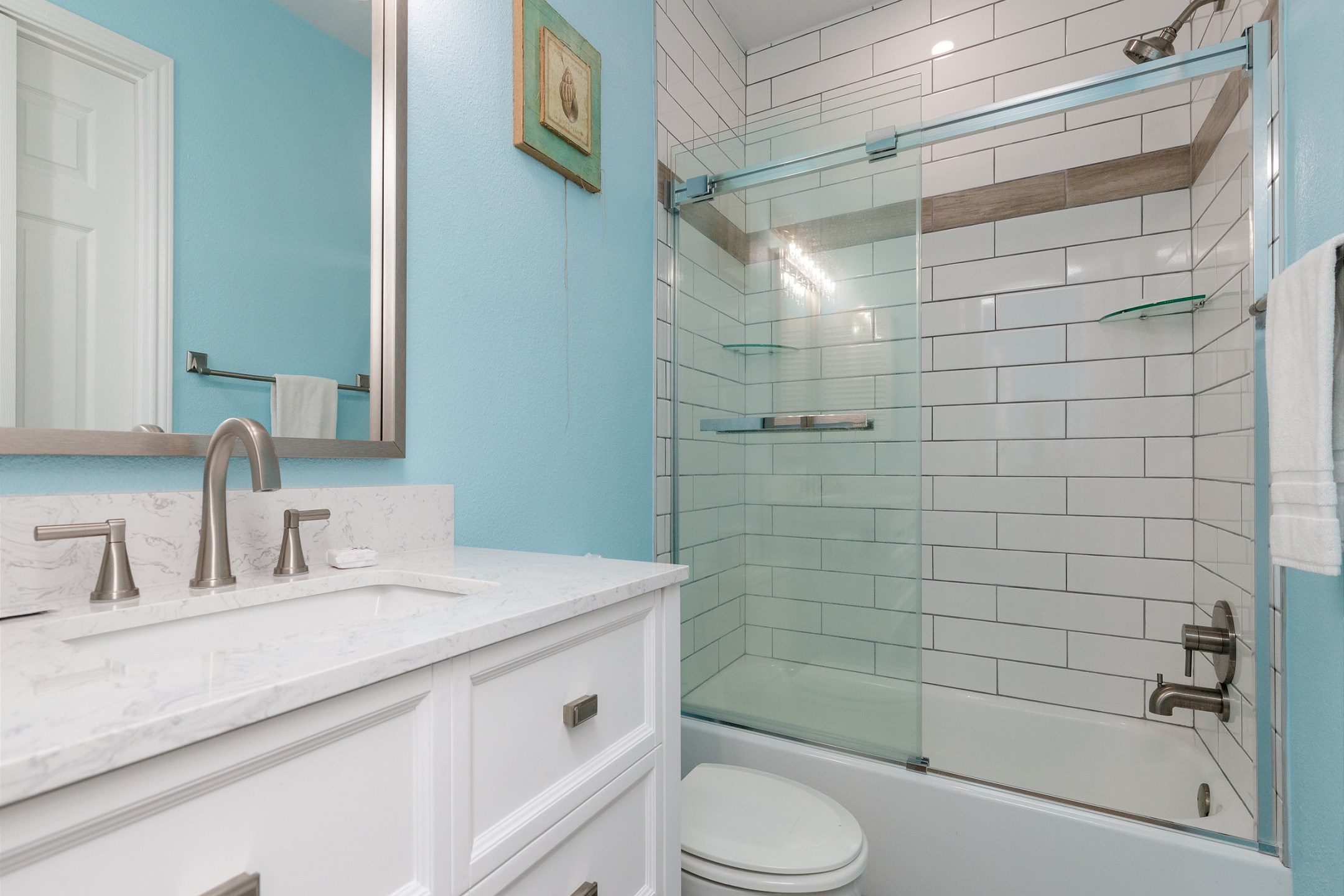 Guest bathroom with tub and shower combo