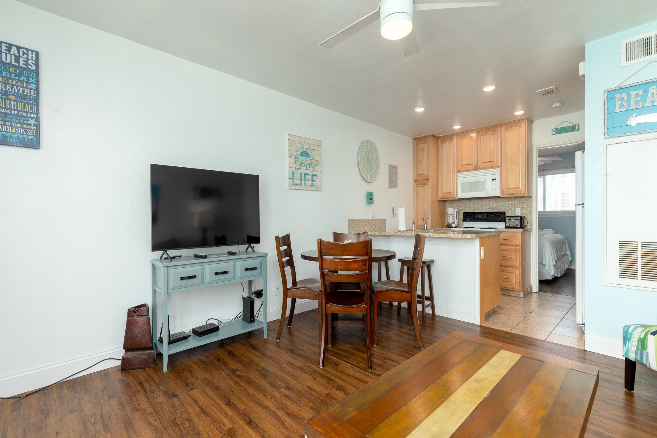 Inviting family hub with seamlessly integrated kitchen, dining, and living areas, perfect for creating lasting memories