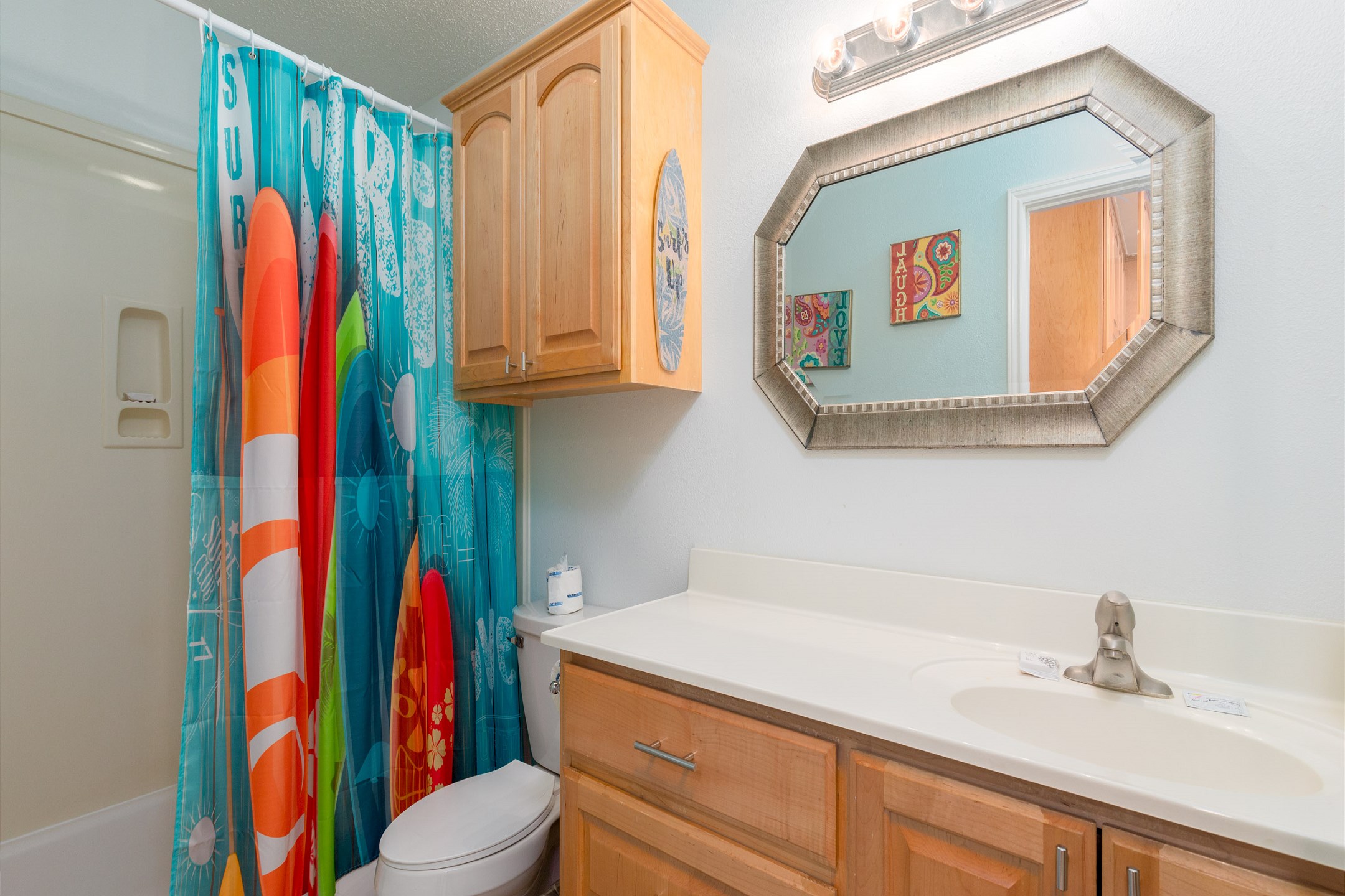 Guest bathroom with tub and shower 