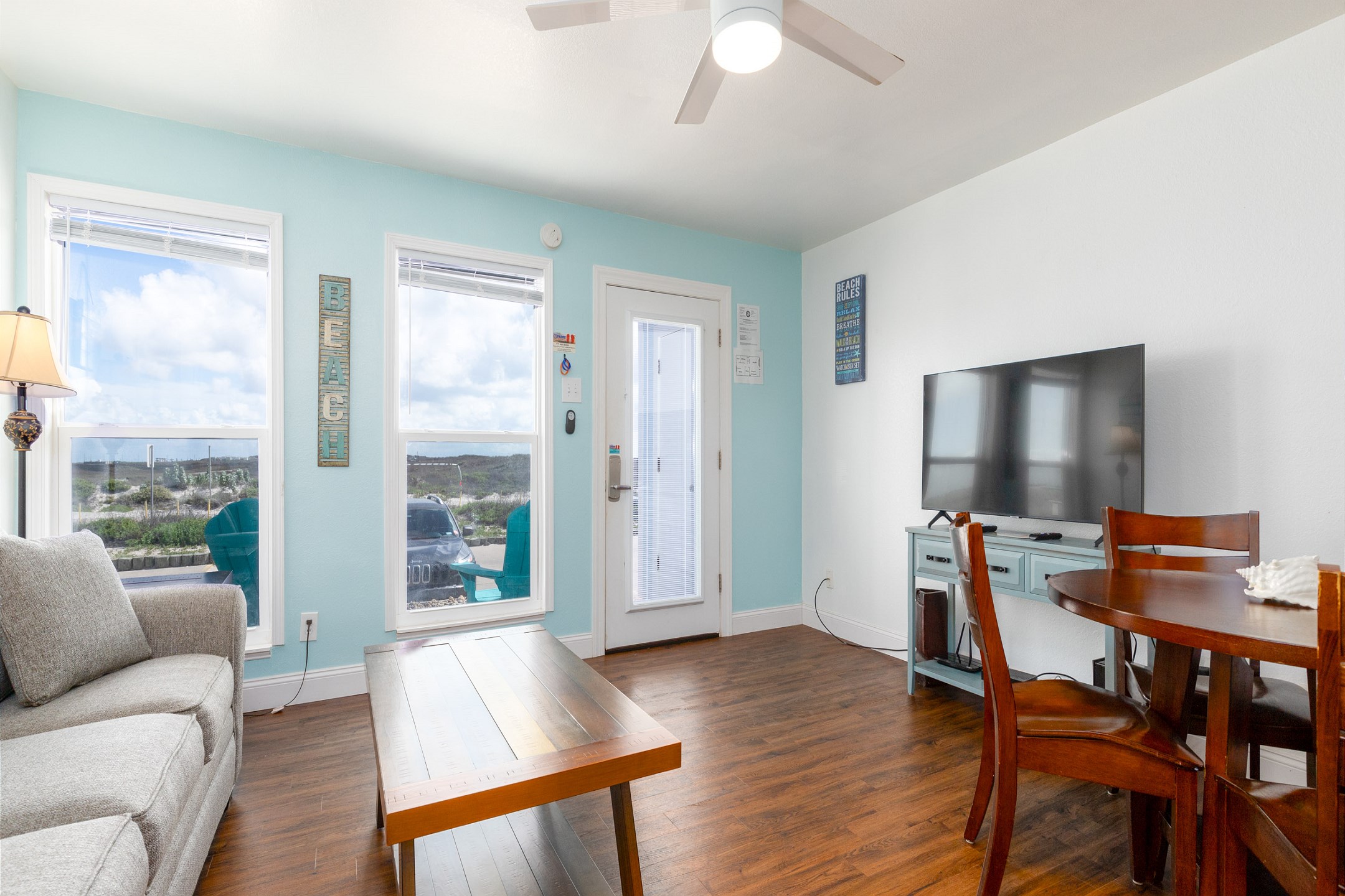 Bright living space with flat screen TV to enjoy 