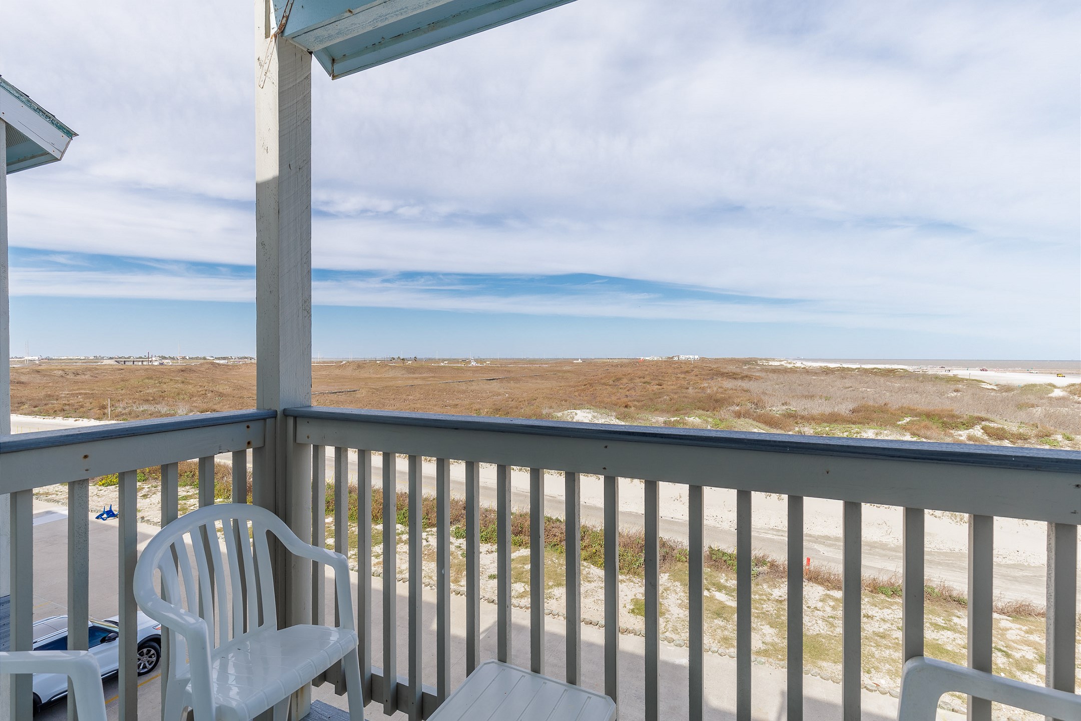 Master bedroom balcony with a beach view