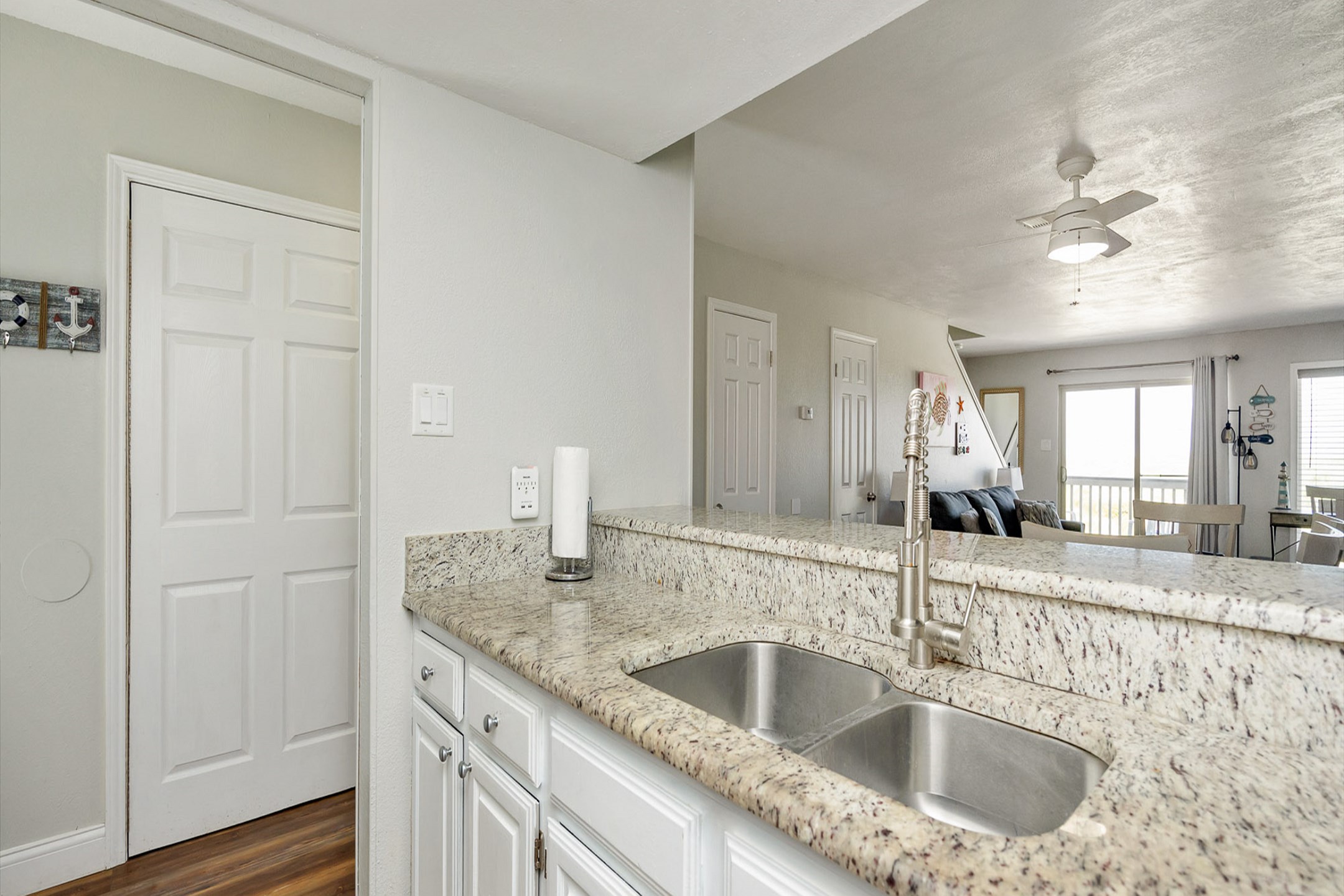 Experience culinary charm in this cozy kitchen, where efficiency meets elegance