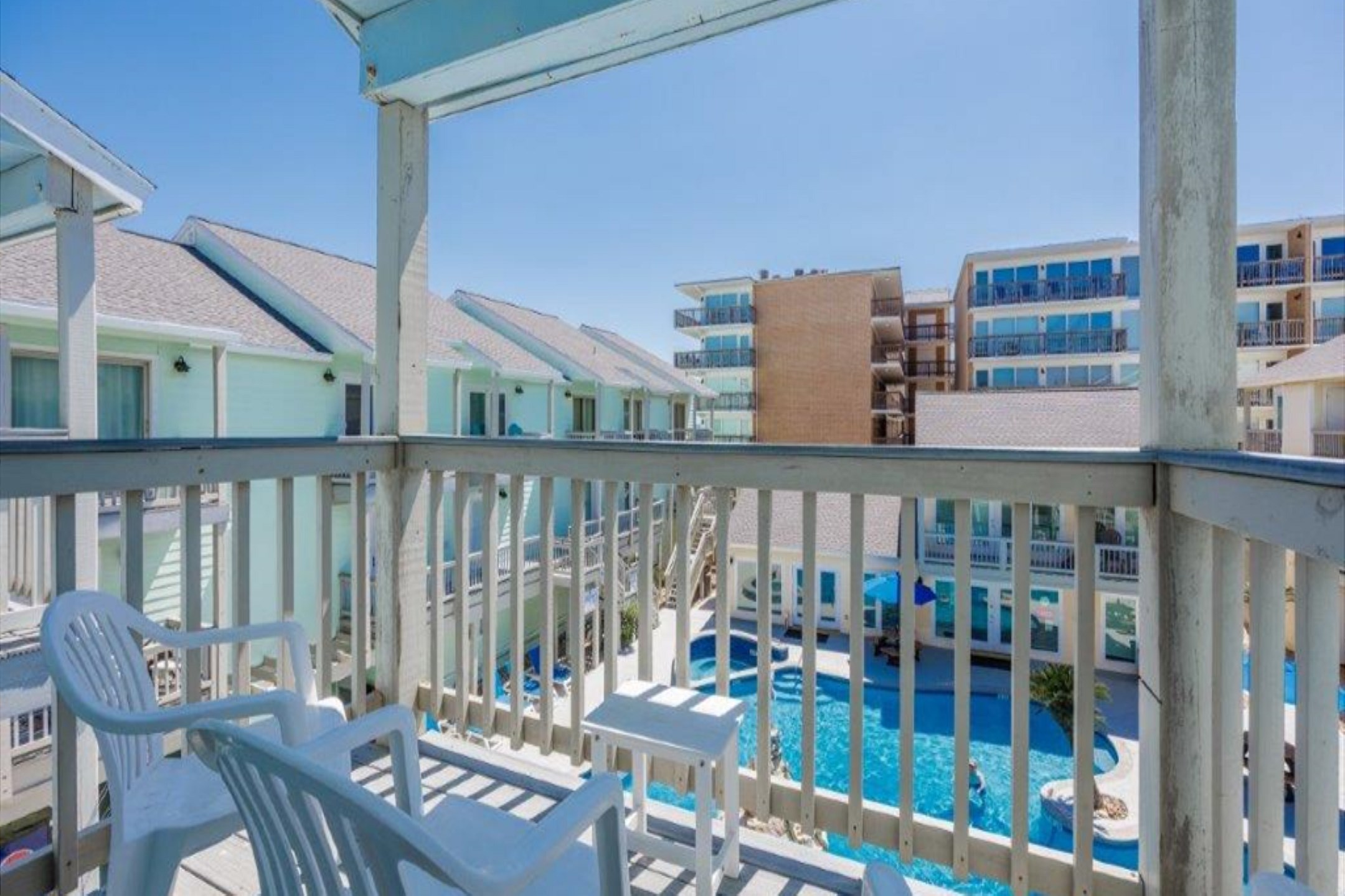 Pool view from guest bedroom balcony