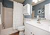 Master bathroom with tub / shower combo 