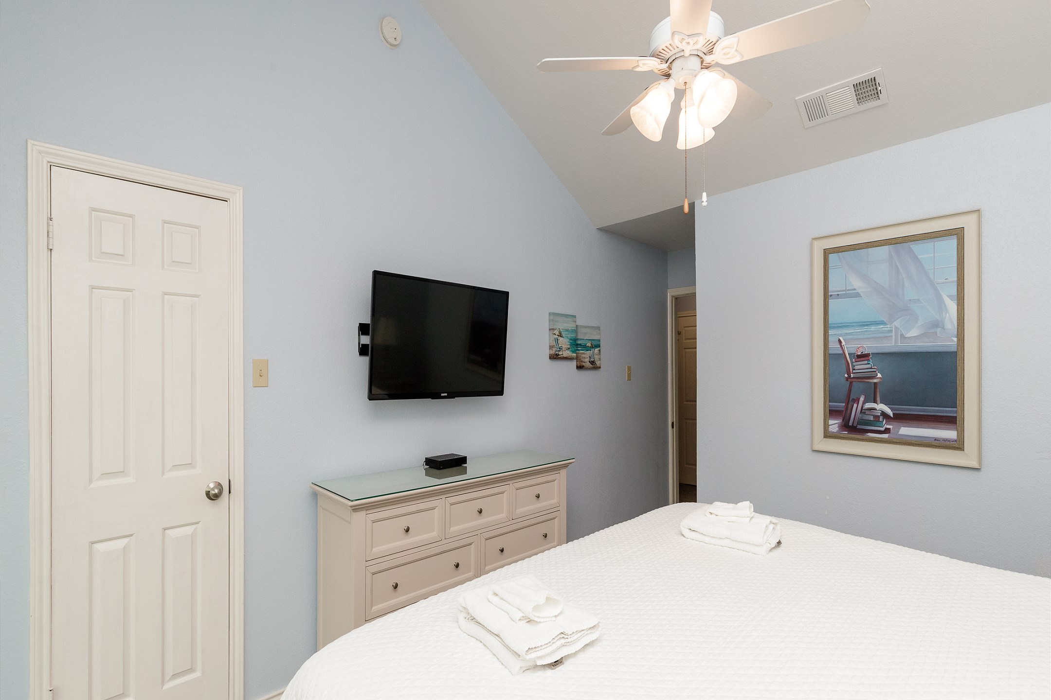 Master bedroom on the second floor with king size bed, ensuite bathroom, private balcony and flat screen TV
