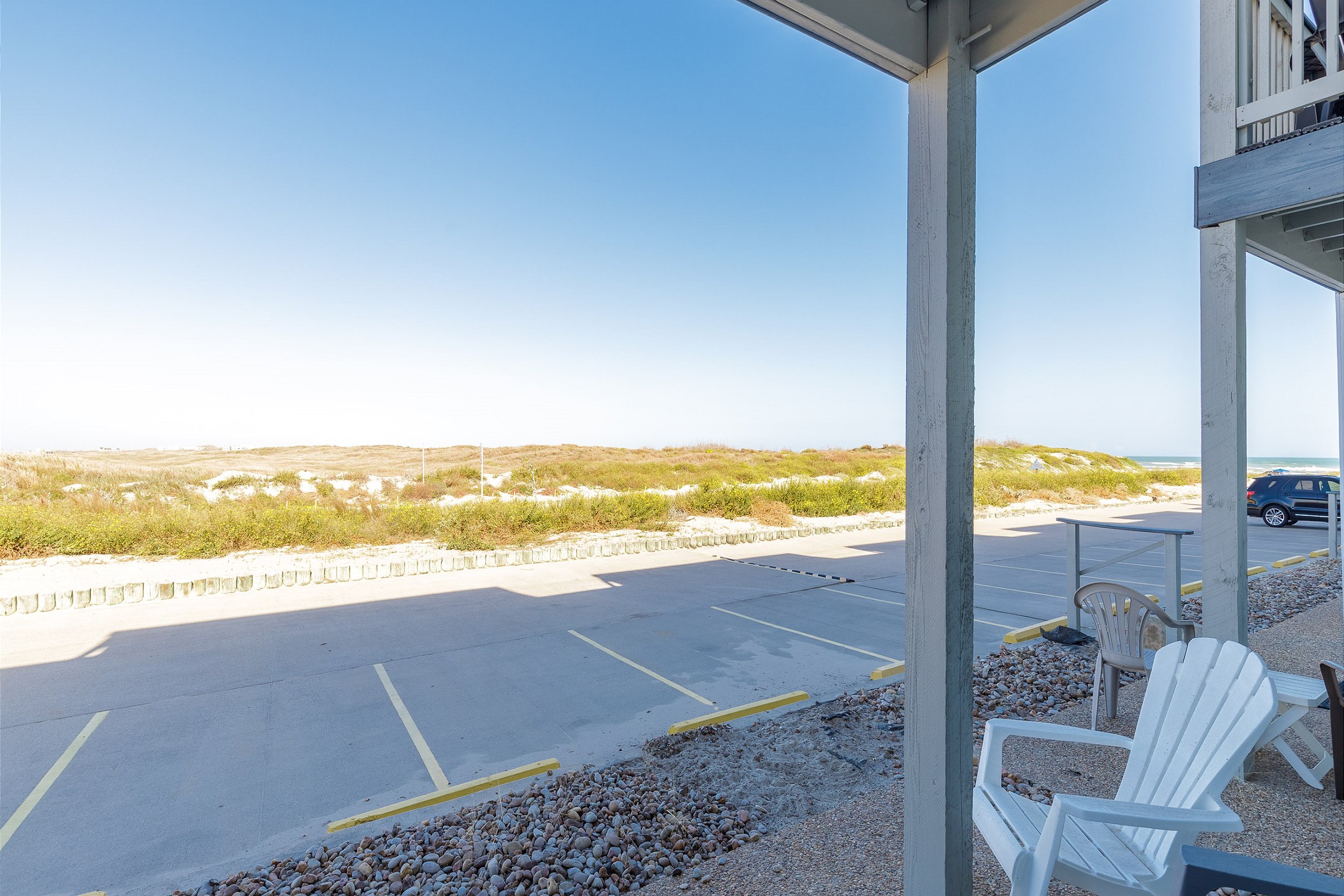 Enjoy lovely views from your patio, just steps from the beach—Perfect for you and your pet
