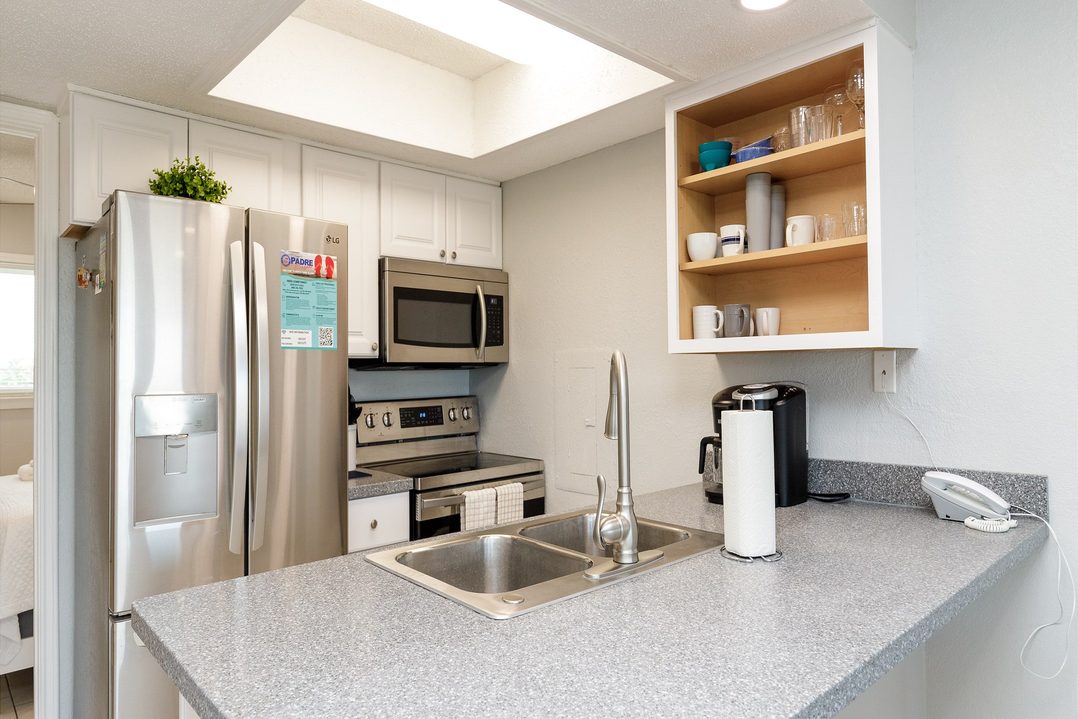 Experience culinary charm in this cozy kitchen, where efficiency meets elegance