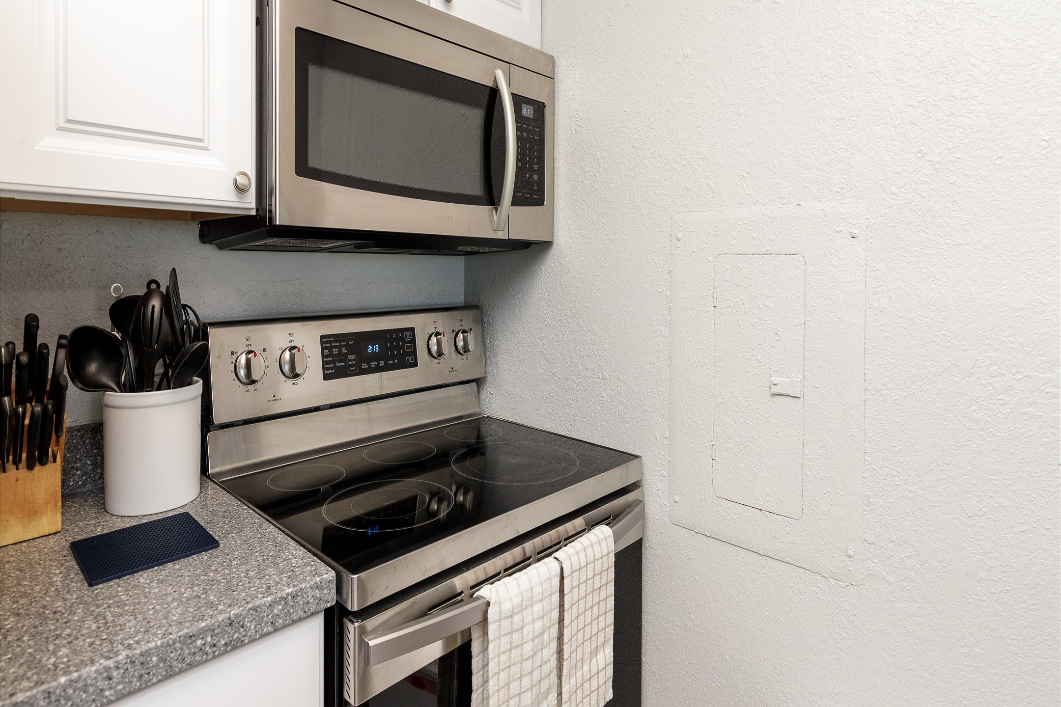 Fully equipped kitchen with stainless steel appliances 