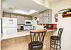 Kitchen area breakfast bar with seating for two 