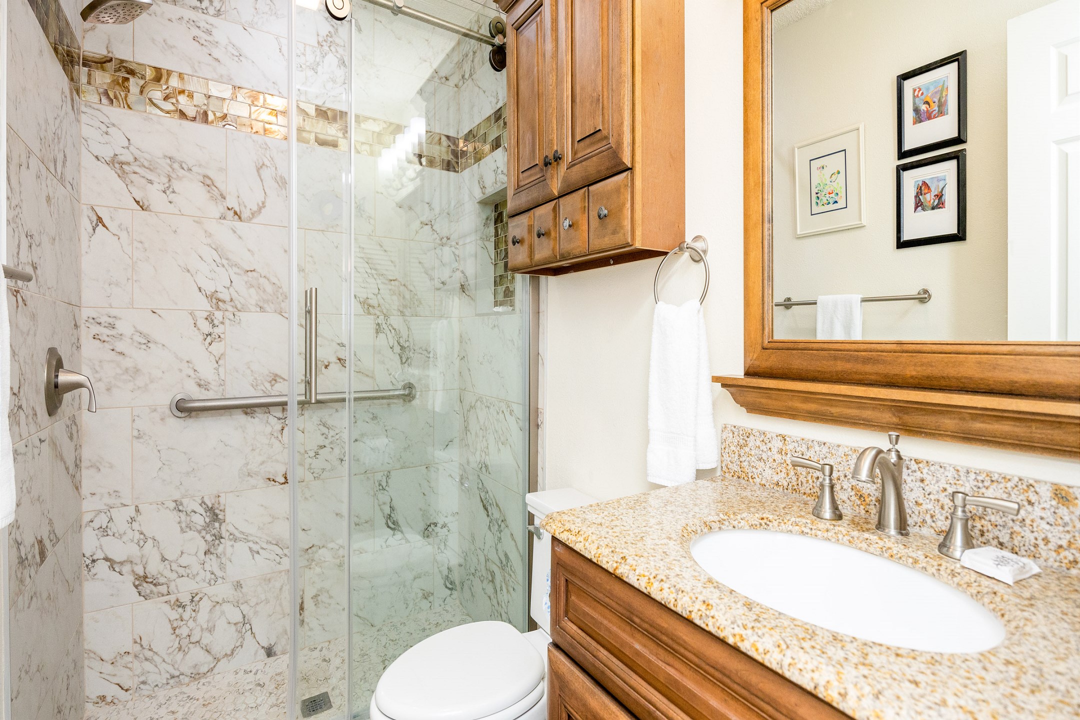 Guest bathroom on the second floor with walk-in shower 