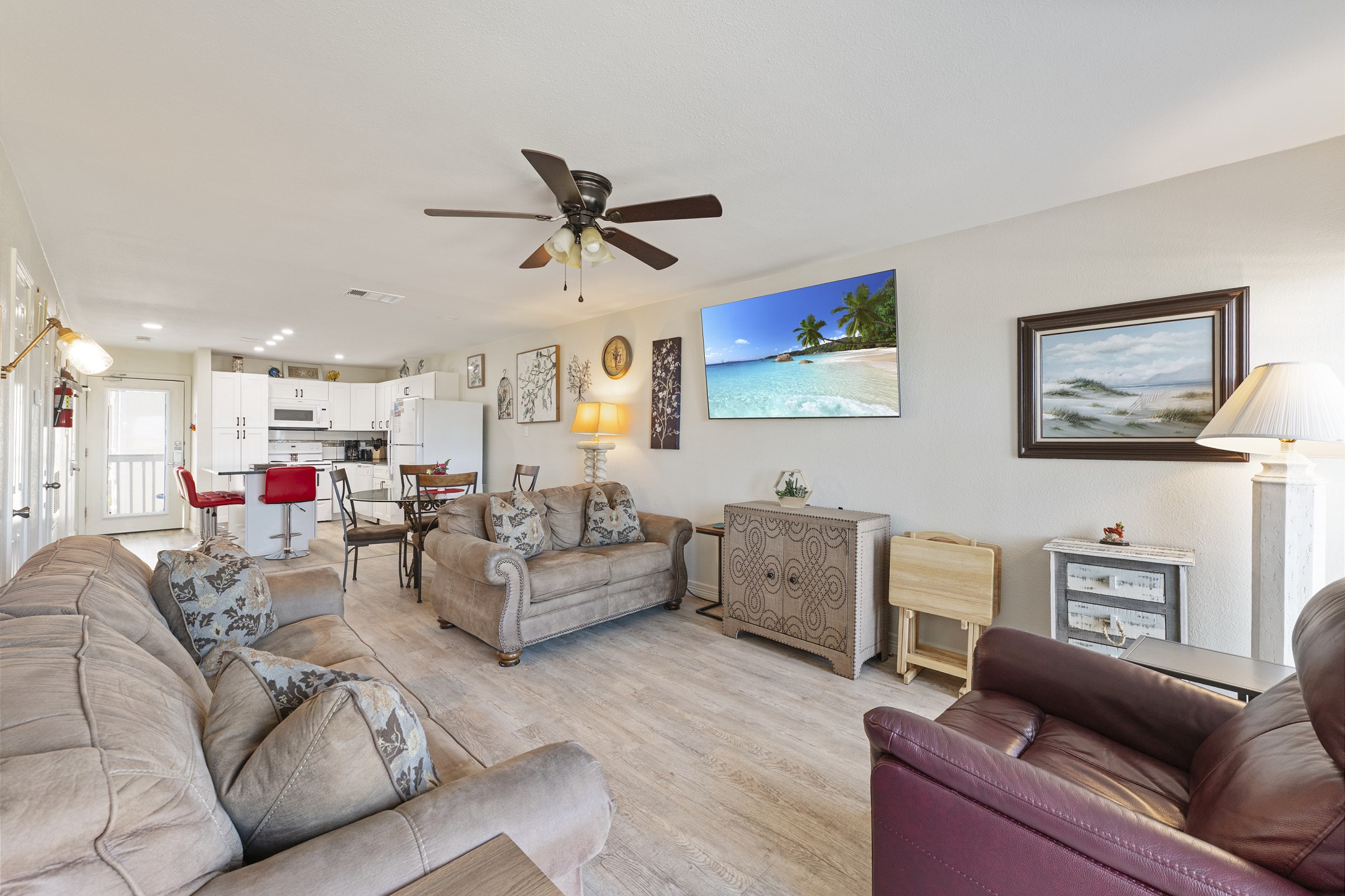 Inviting gathering space with seamlessly integrated kitchen, dining, and living areas, perfect for creating lasting memories