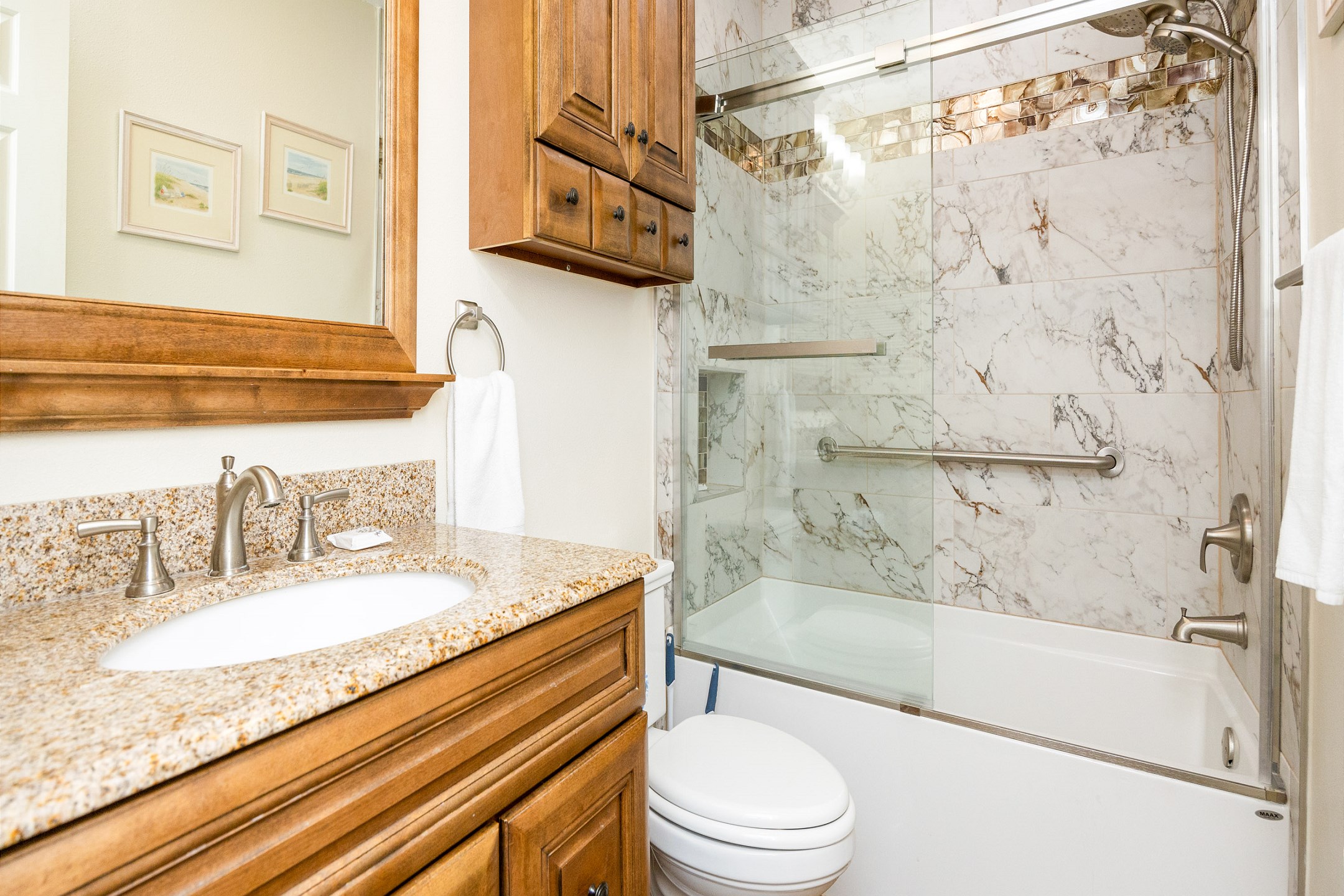 Master bathroom with tub and shower combo