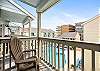 Private balcony from the second bedroom with a pool view