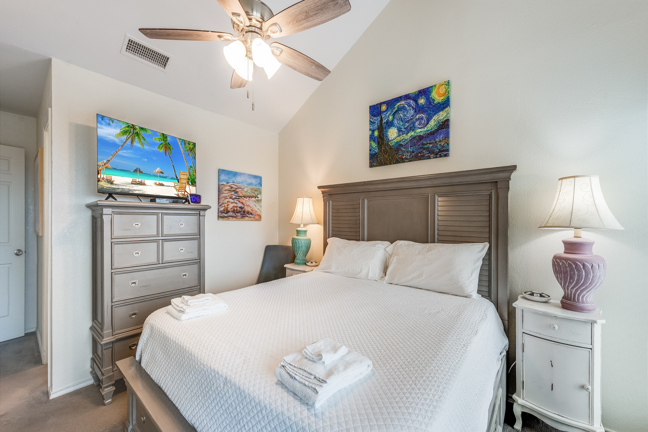 Master bedroom with king size bed, ensuite bathroom, private balcony and flat screen TV