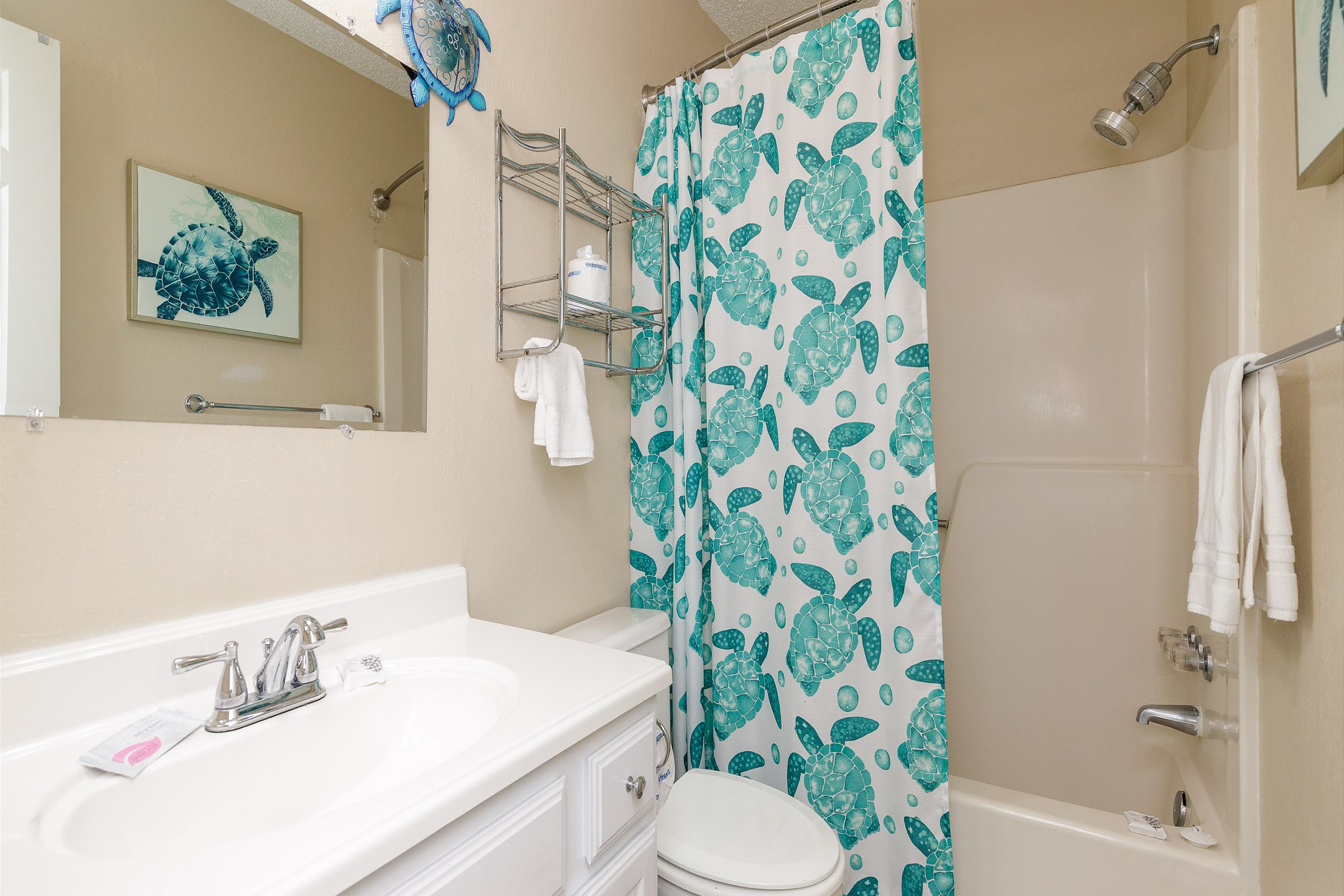 Guest bathroom on the second floor with tub and shower combo