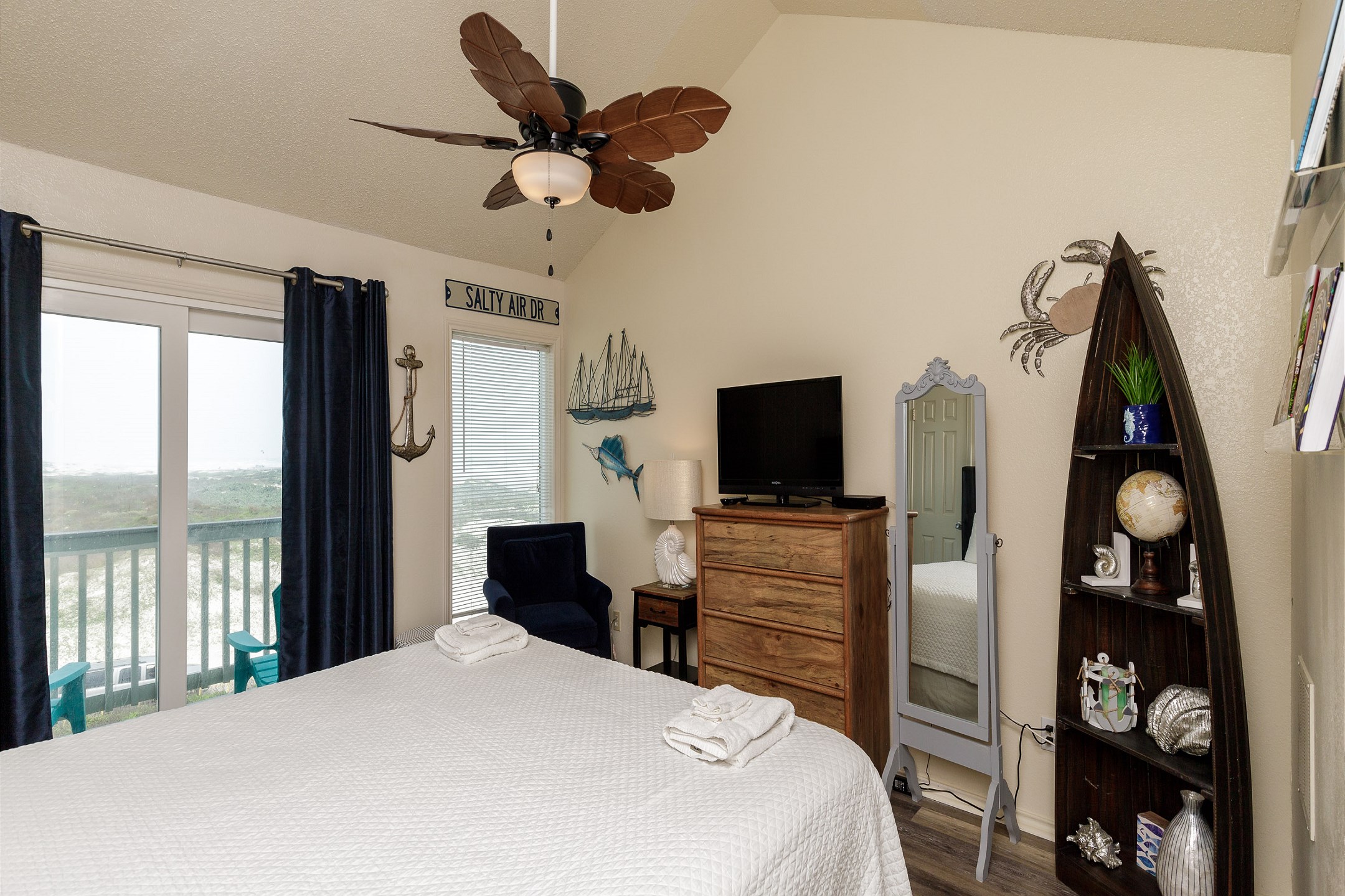 Master bedroom on the second floor with king size bed, private balcony, ensuite bathroom and flat screen TV