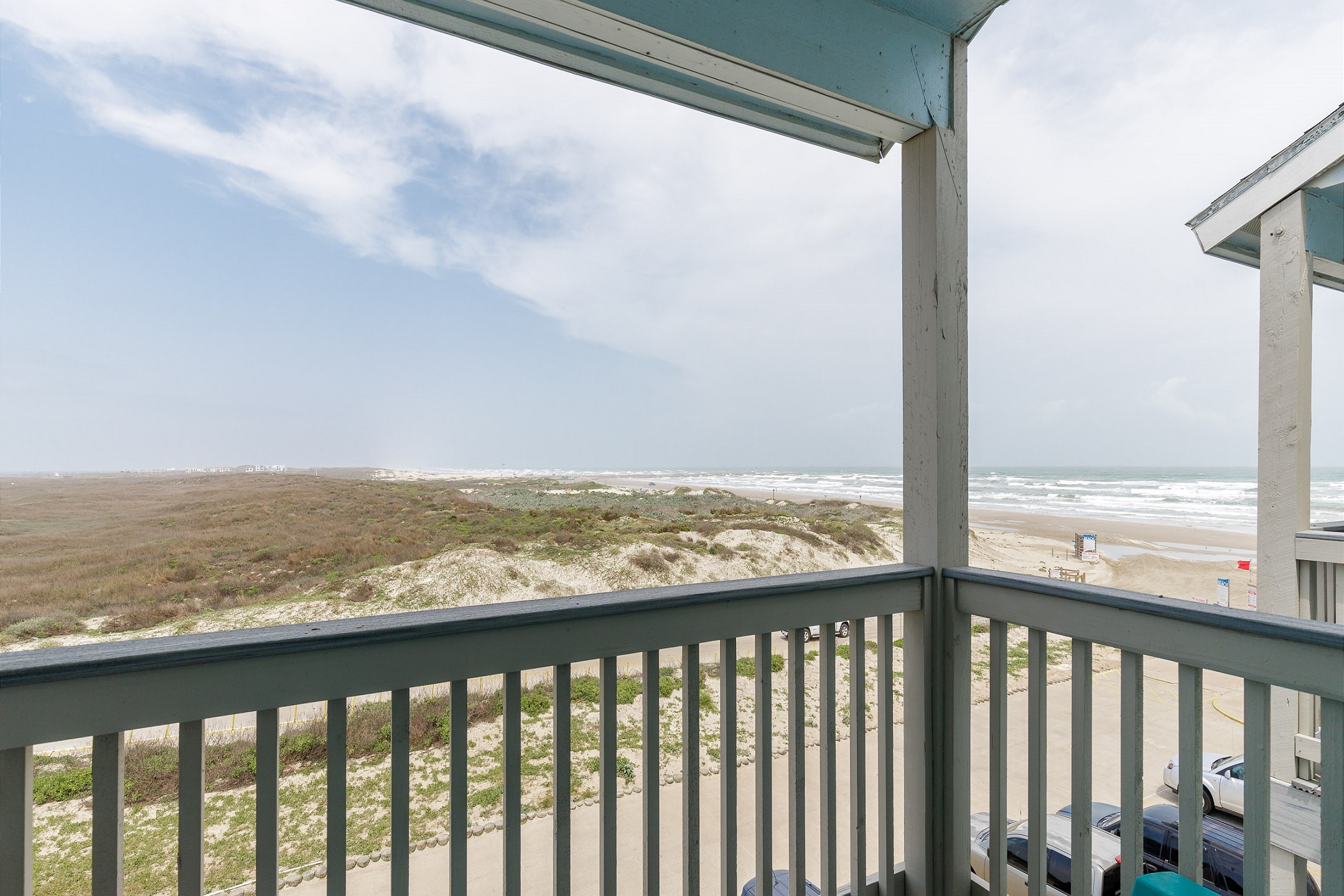 Private balcony off master bedroom with a beach view 