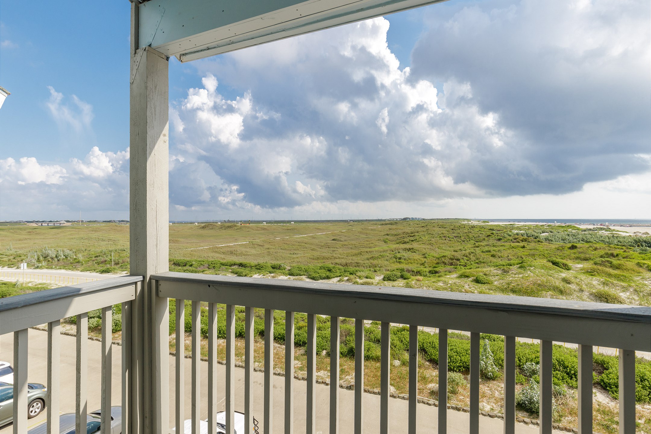 View of the dunes and the beach from the master bedroom balcony