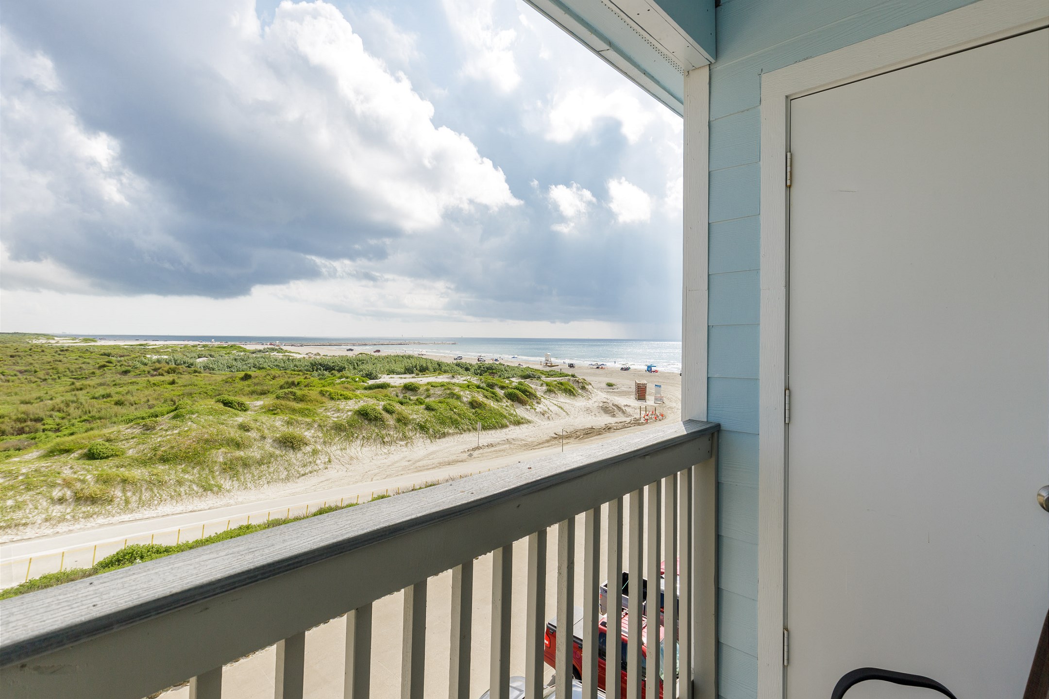 Private master bedroom balcony with a stunning beach view