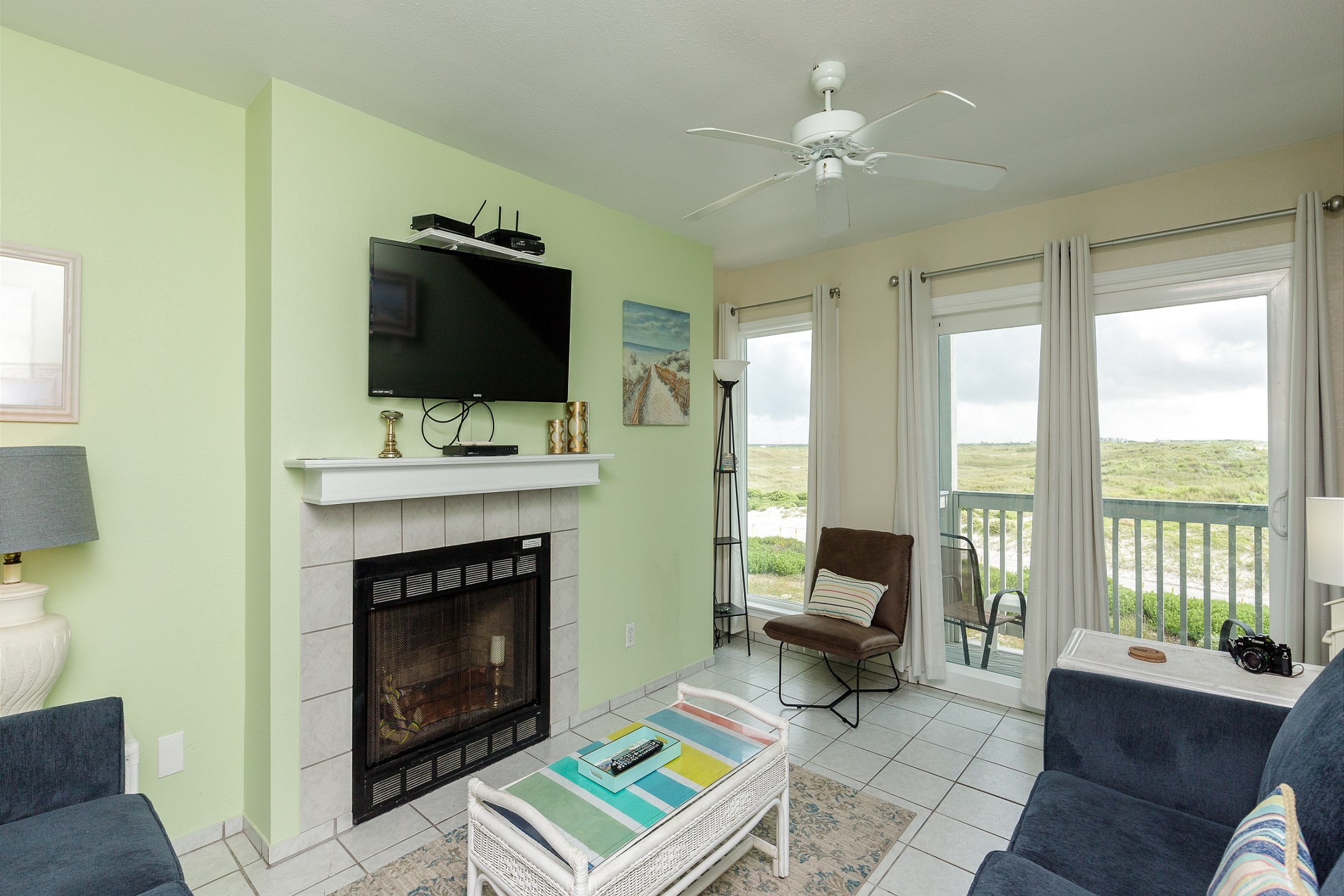 Enjoy beautiful views and access to the outdoor balcony from the comfort of the living area
