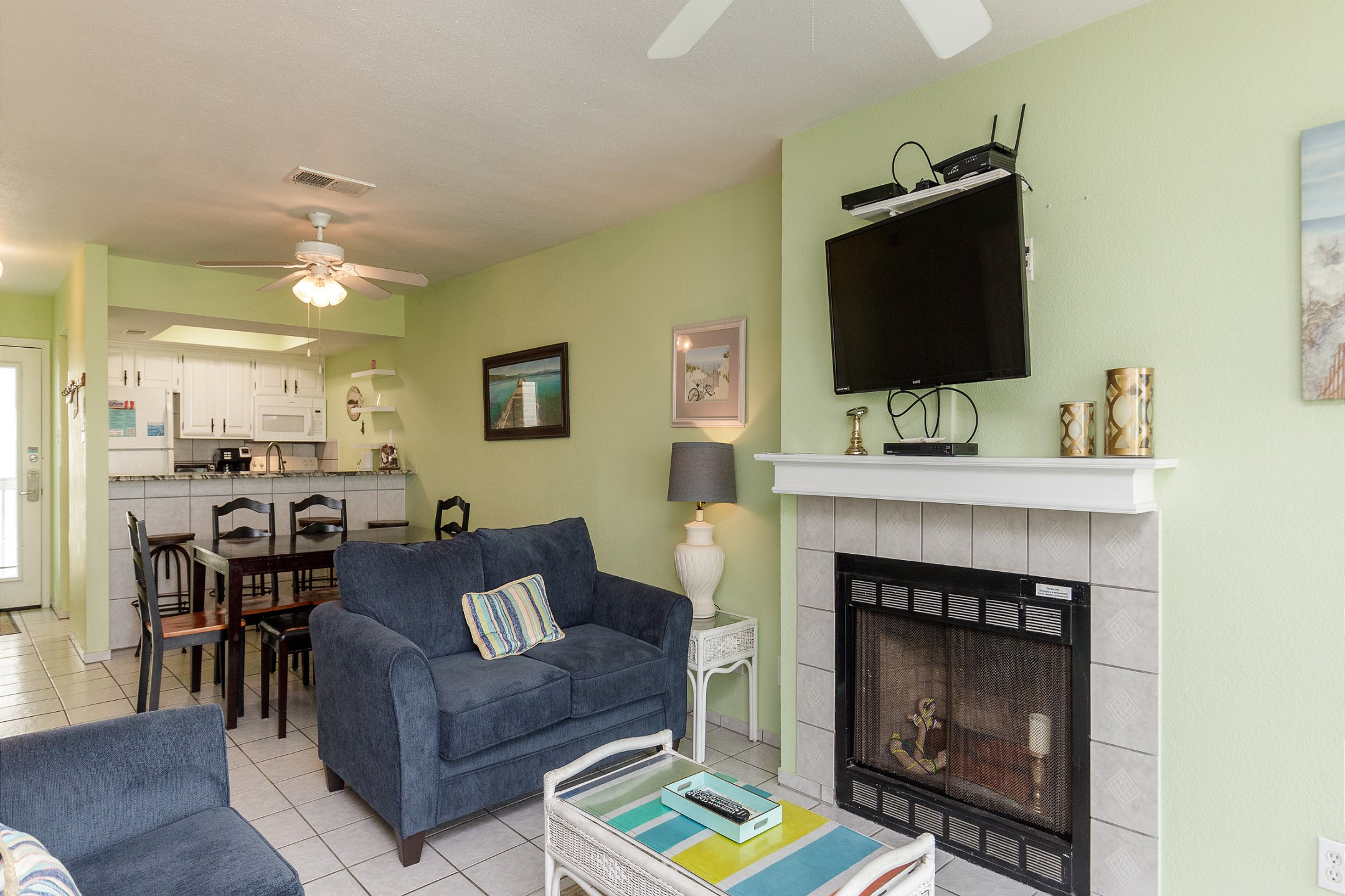 Expansive social hub with a gourmet kitchen, formal dining area, and plush living room