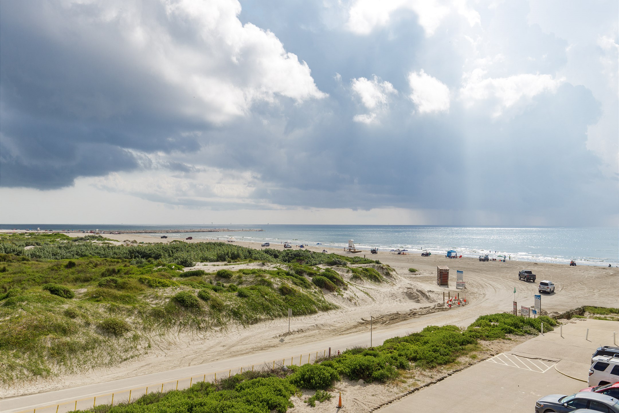 Living area balcony with a beach view