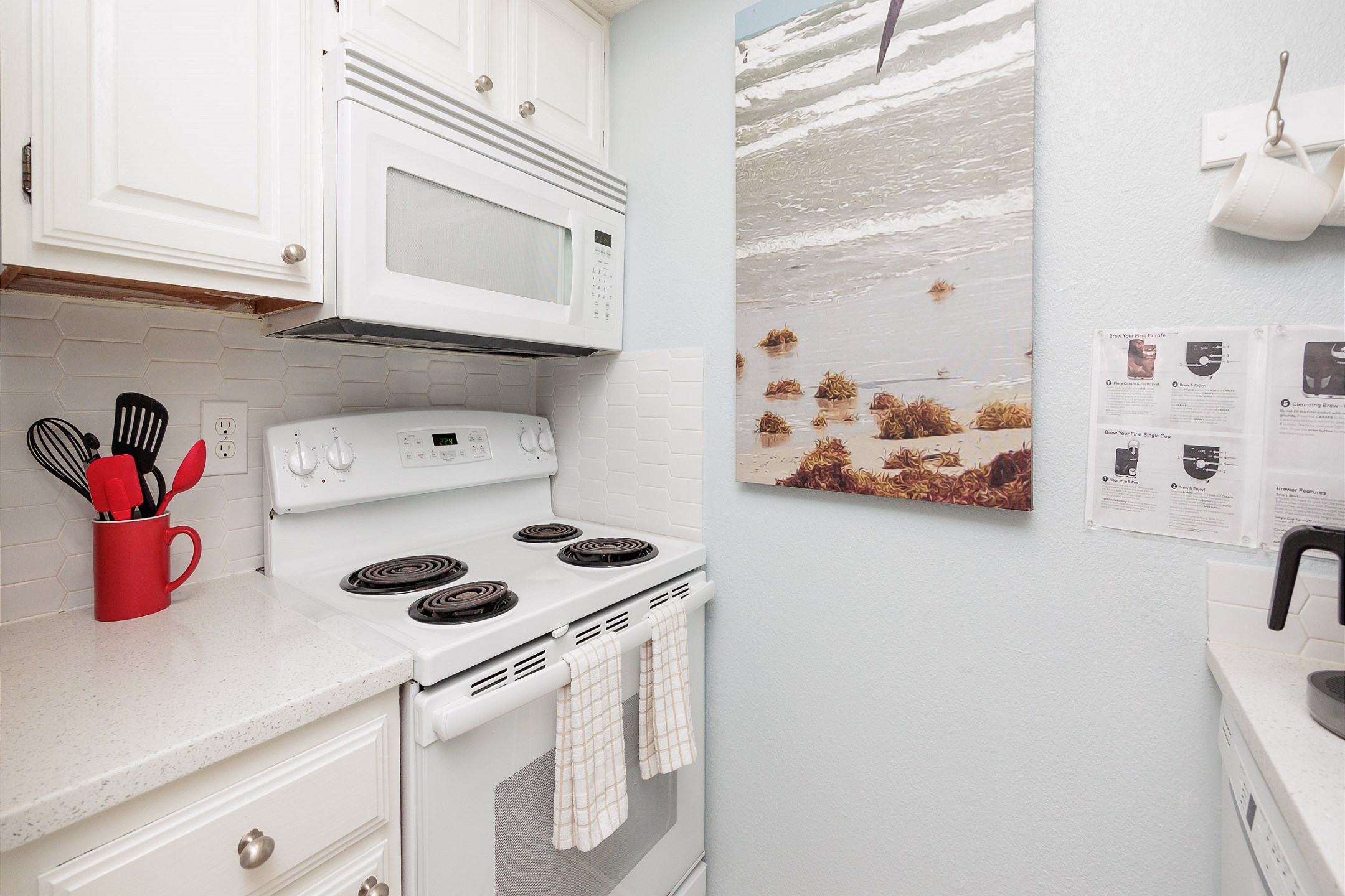 Fully equipped kitchen area with full size appliances and new counter tops 