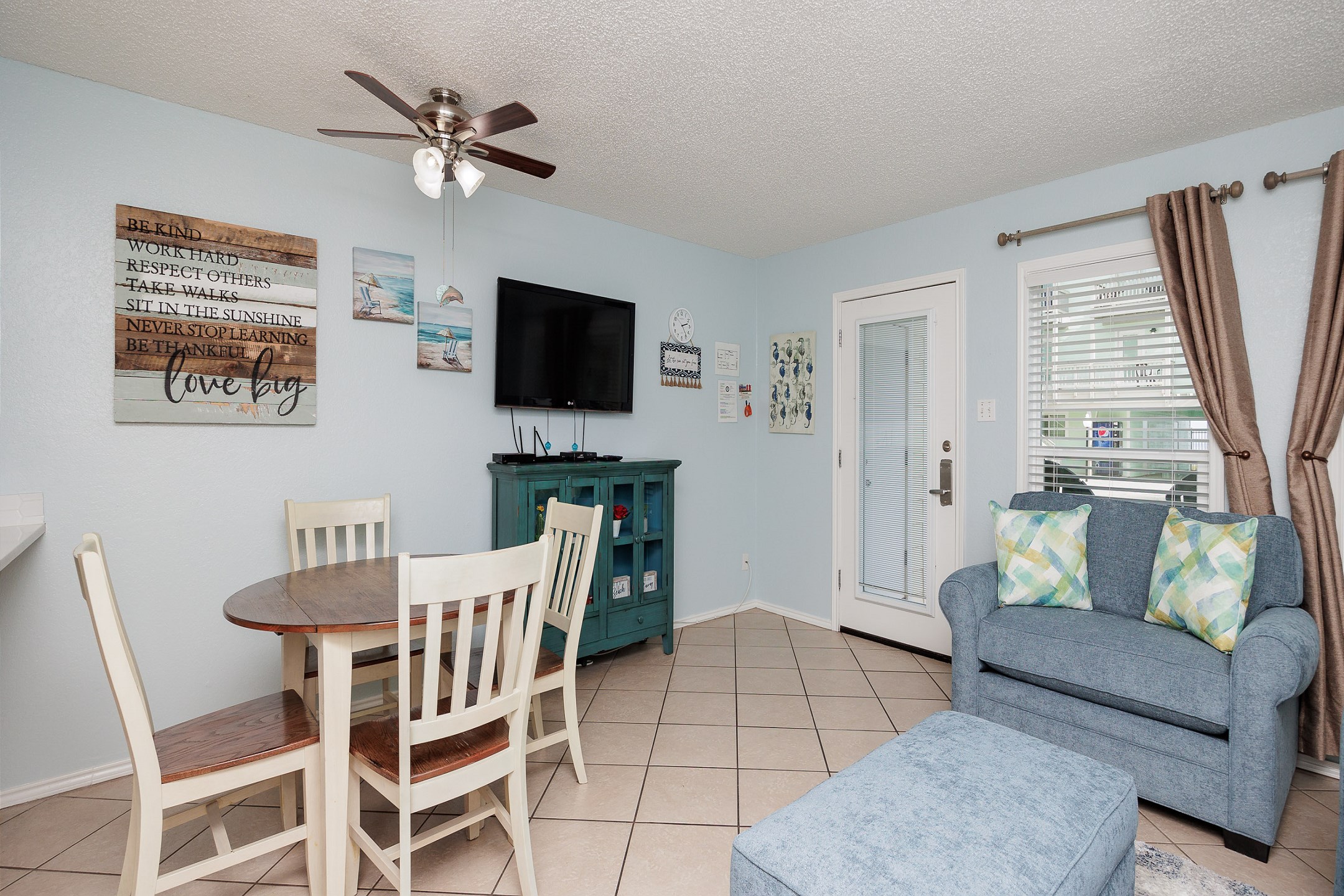 Spacious living area with flat screen TV to enjoy on the new cozy sofa 