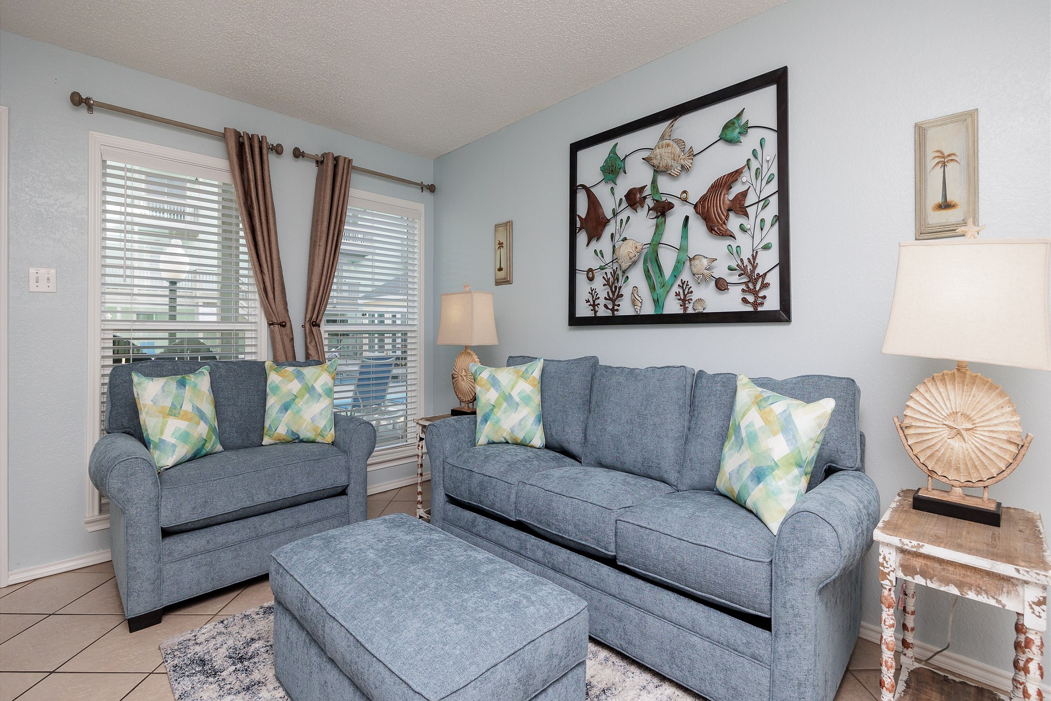 Chic and cozy gathering space with queen size sleeper sofa, the perfect ambience for unwinding after a day of fun in the sun