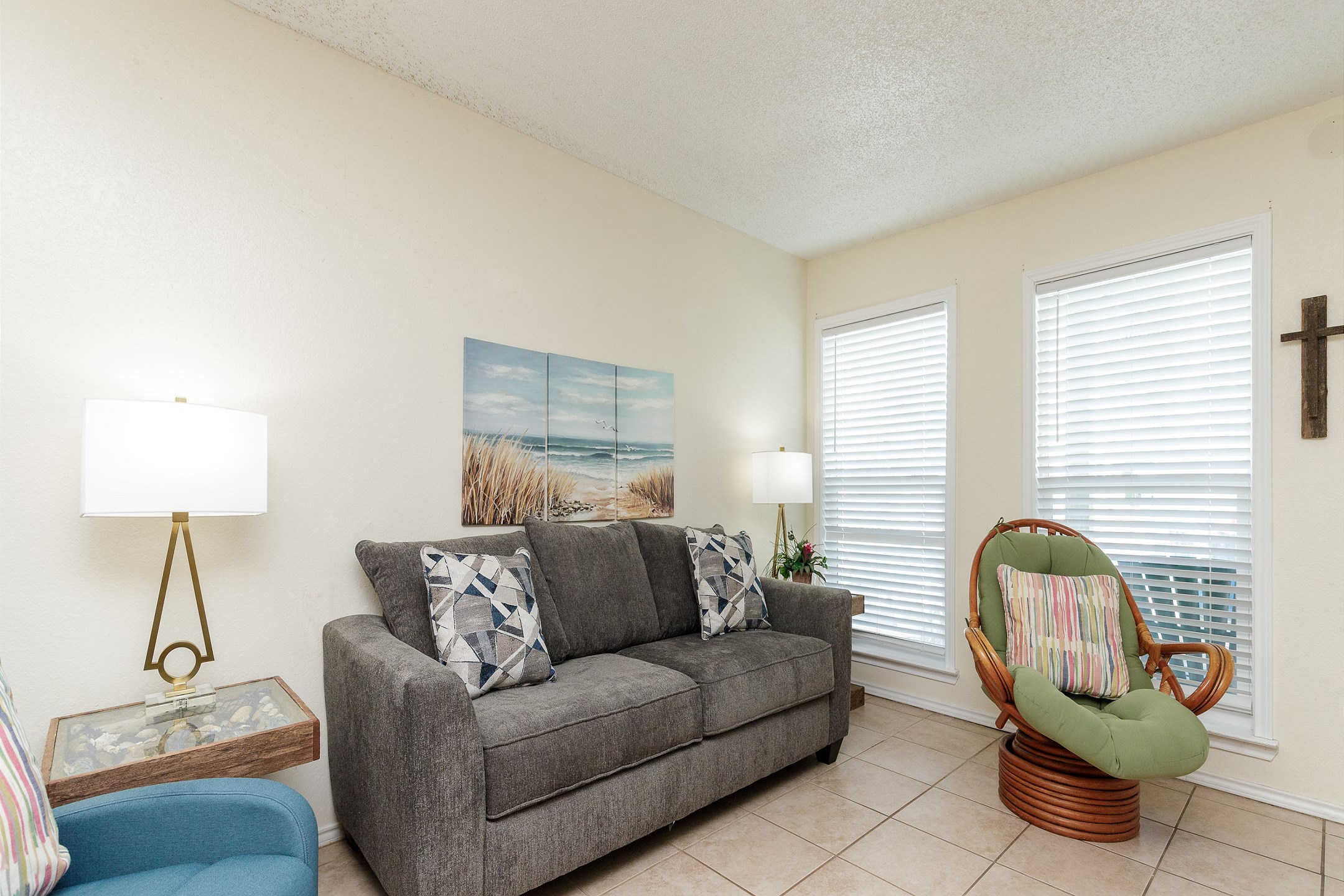 Bright and airy living space filled with natural light in this convenient poolside retreat
