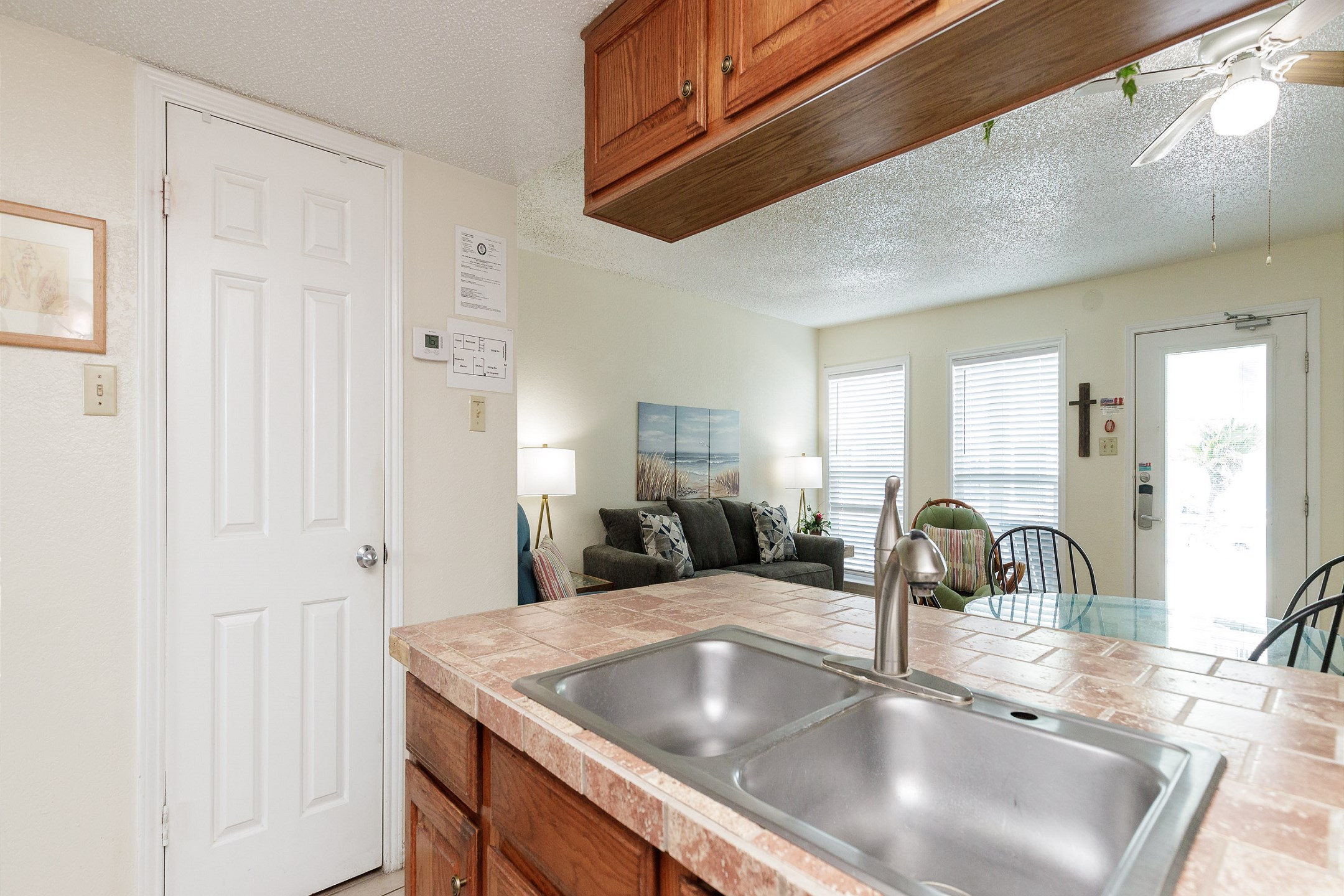 Fully stocked with cookware, utensils, and dinnerware for your convenience