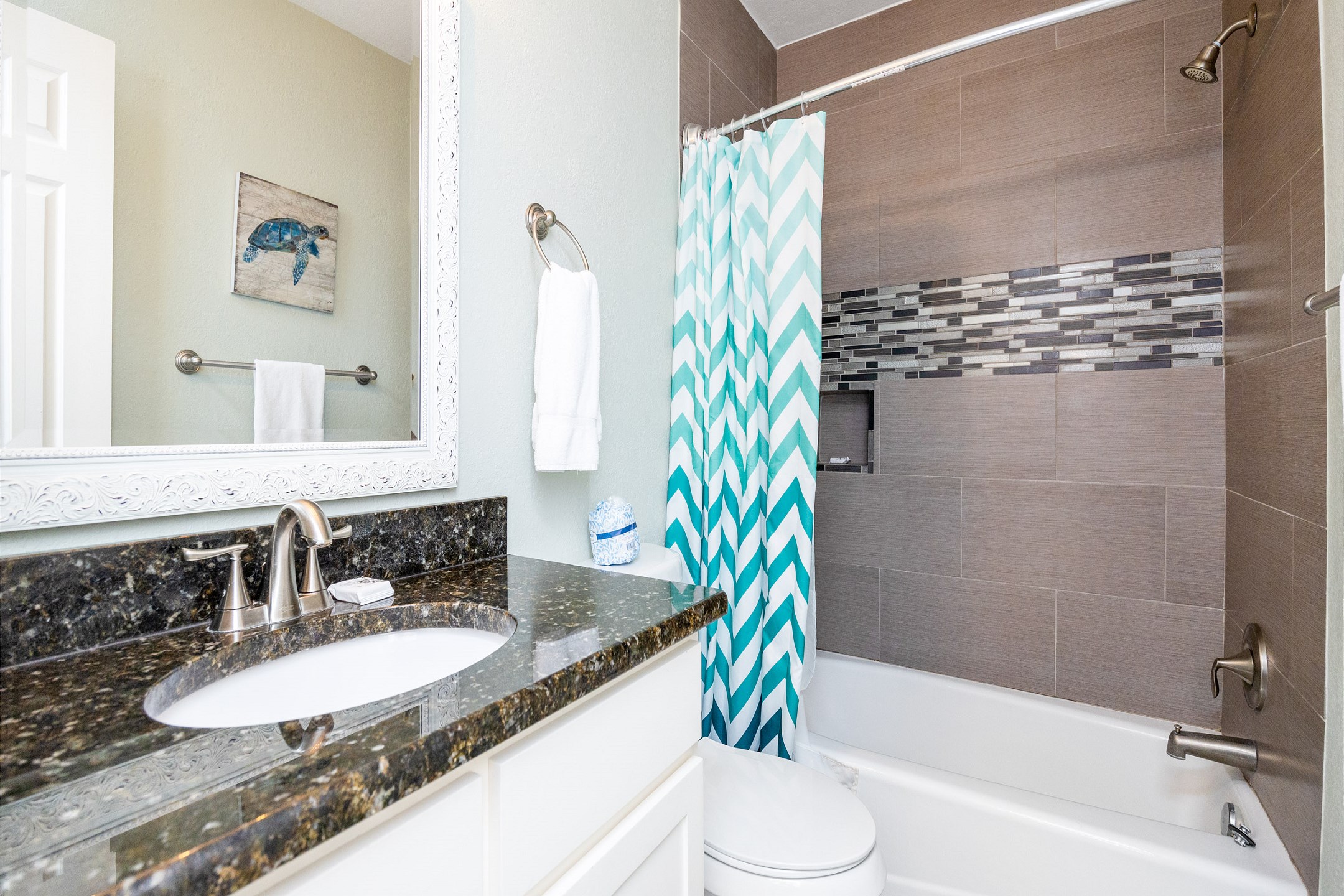 Guest bathroom on the second floor with tub/shower combo 