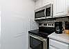Great kitchen space with new stainless steel appliances and upgraded counters and cabinets 
