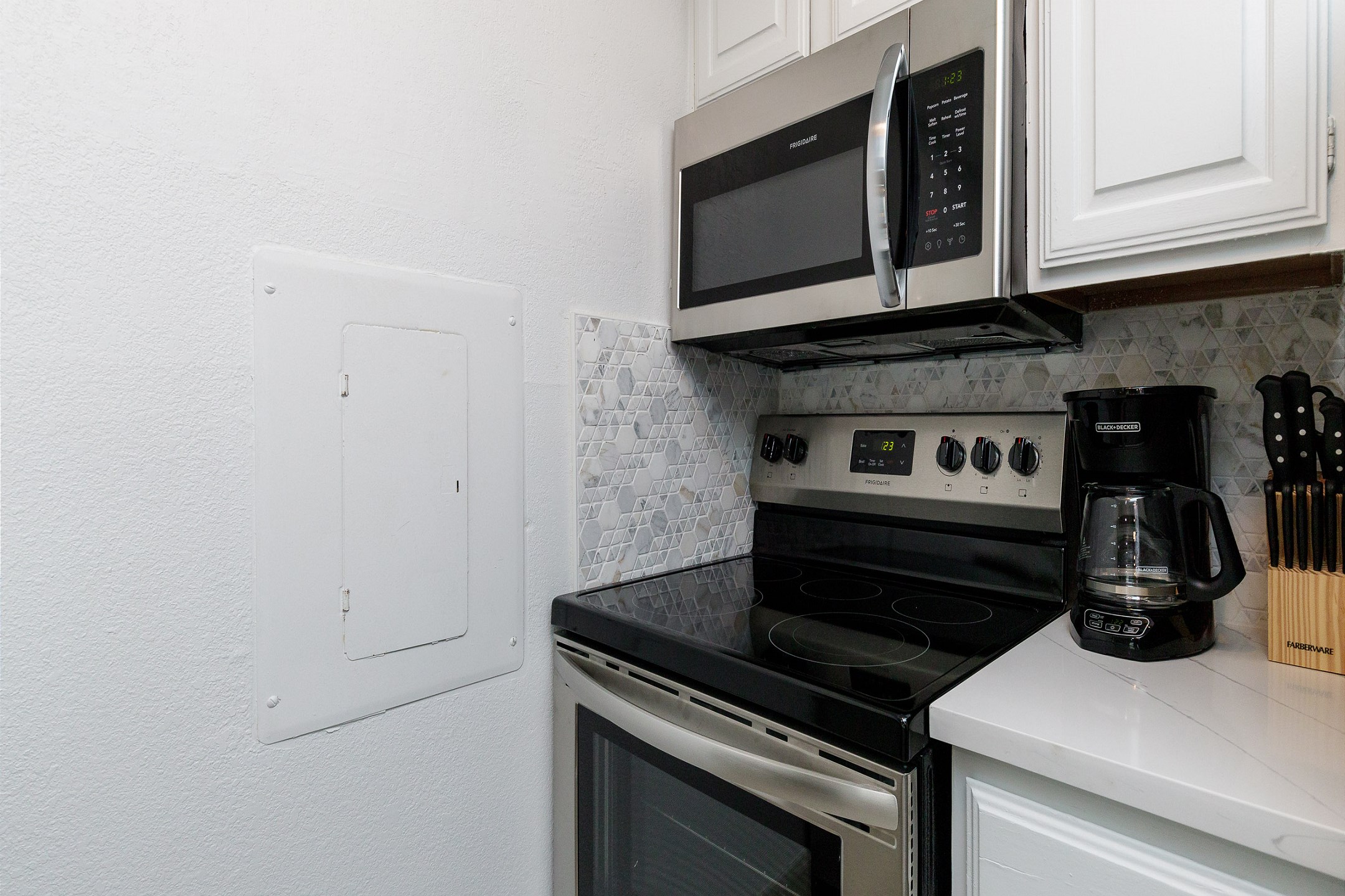 Great kitchen space with new stainless steel appliances and upgraded counters and cabinets 