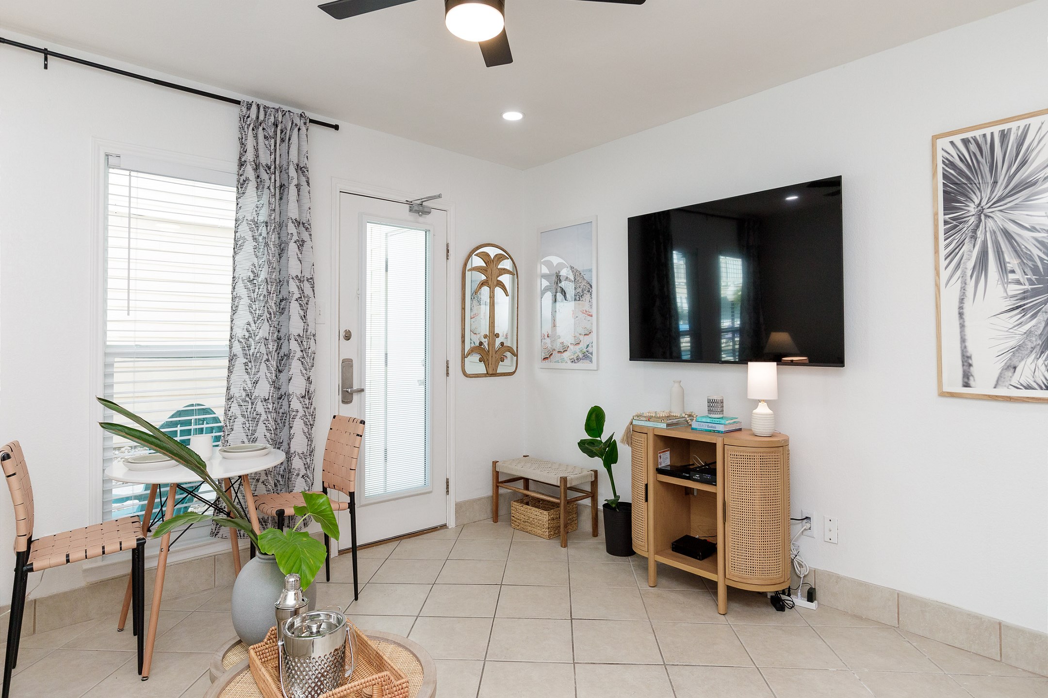 Freshly updated living area with a flat-screen TV—kick back on the sofa and soak in those island vibes