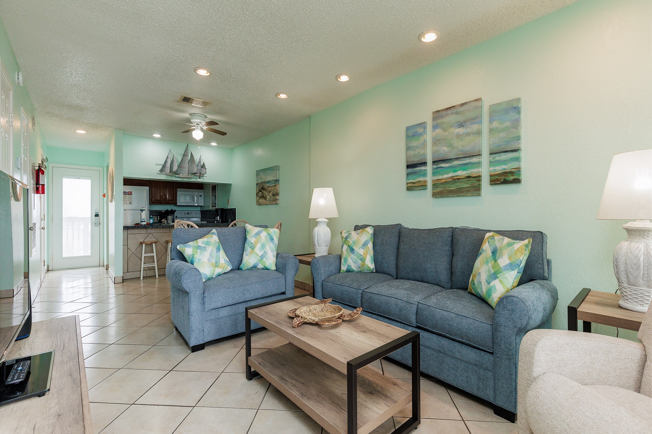 Open-concept living space featuring contemporary furnishings and bathed in natural light