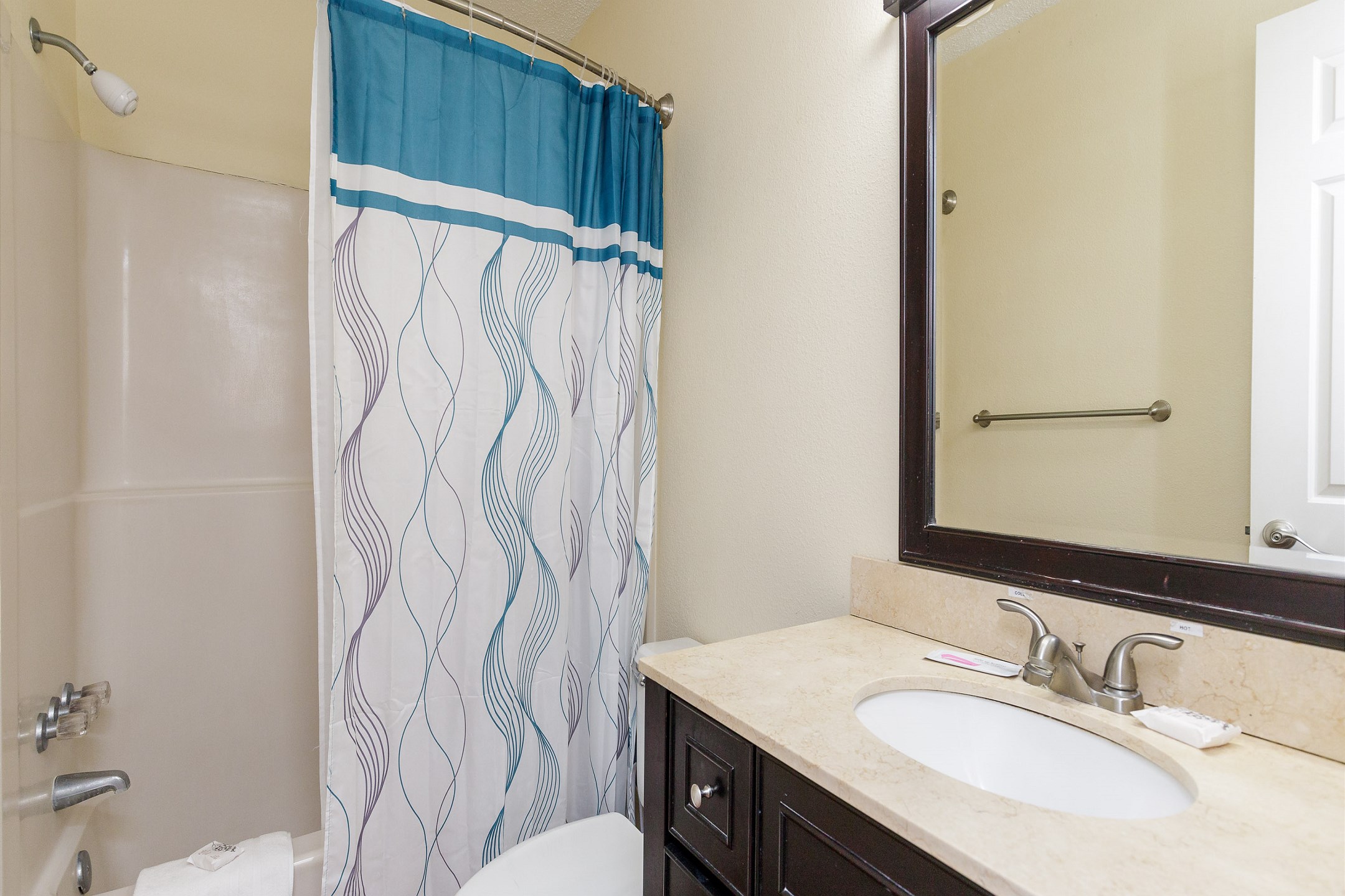 Master bathroom with tub and shower 