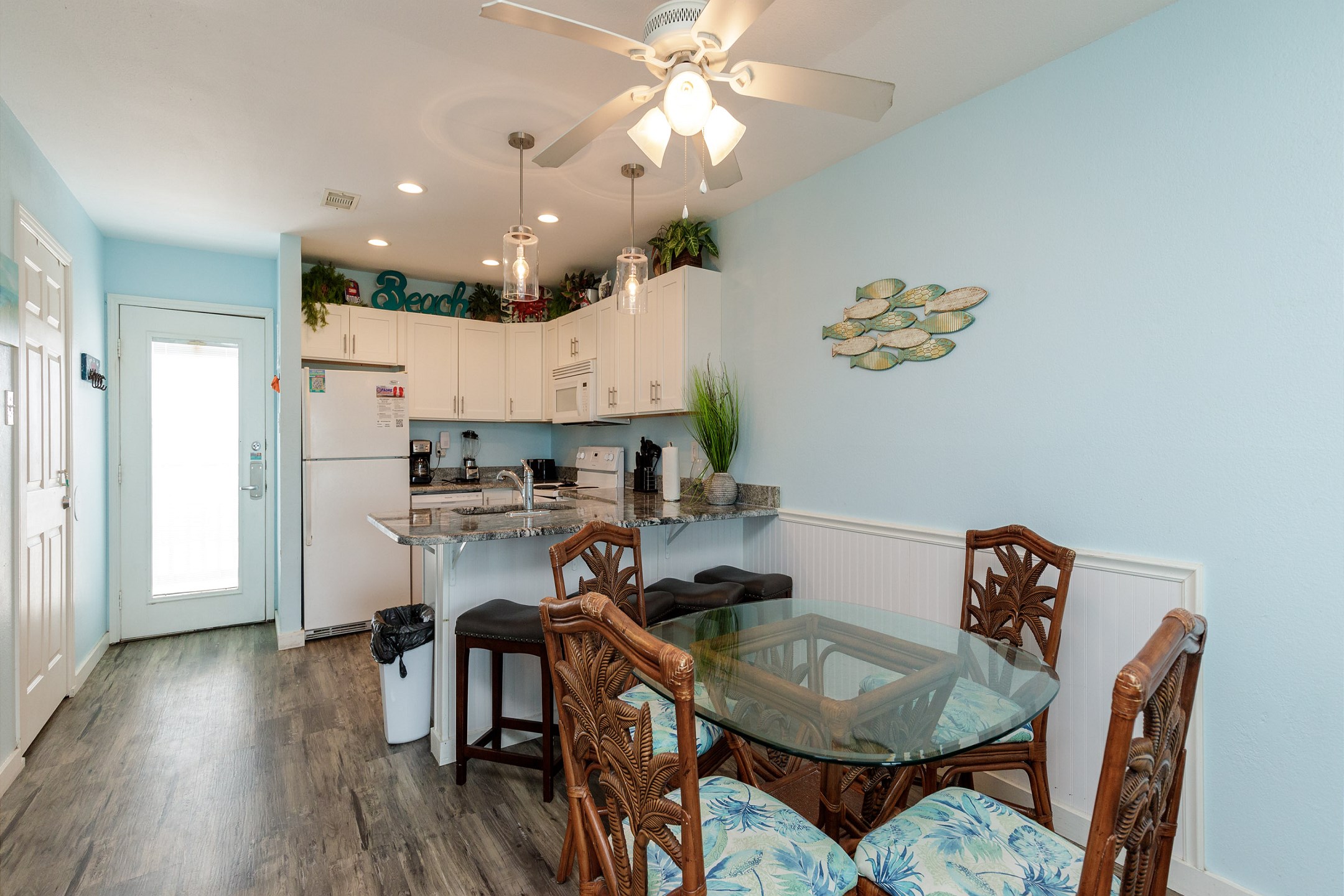 Dining table and breakfast bar with seating for eight 