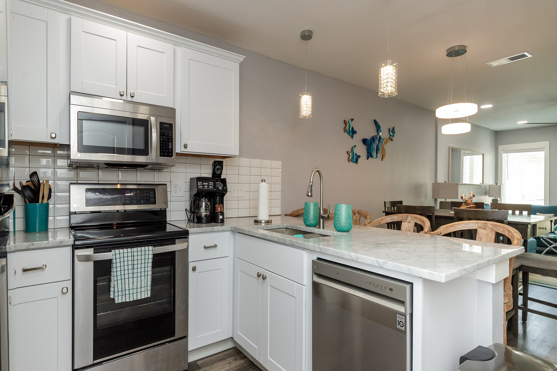 Fully equipped kitchen with stainless steel appliances and lovely features throughout 