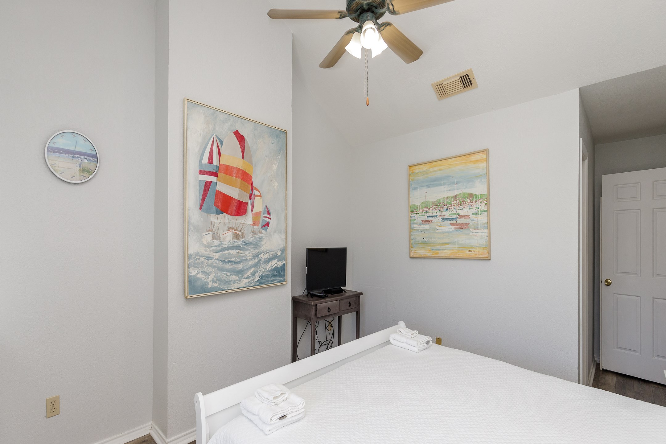 Master bedroom on the second floor with king size bed, private bathroom, balcony and flat screen TV