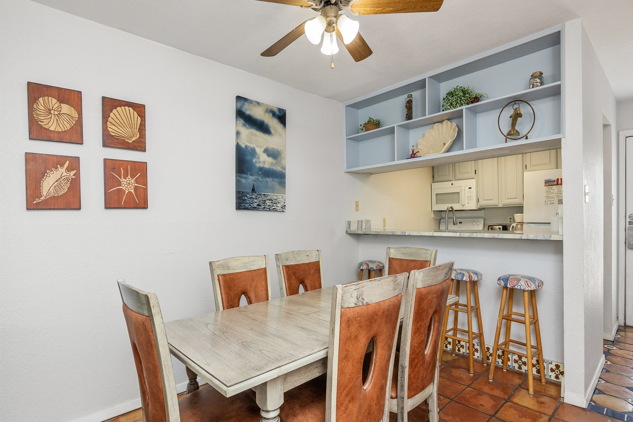 Dining space with seating for eight that offers enough room for game night or family meals