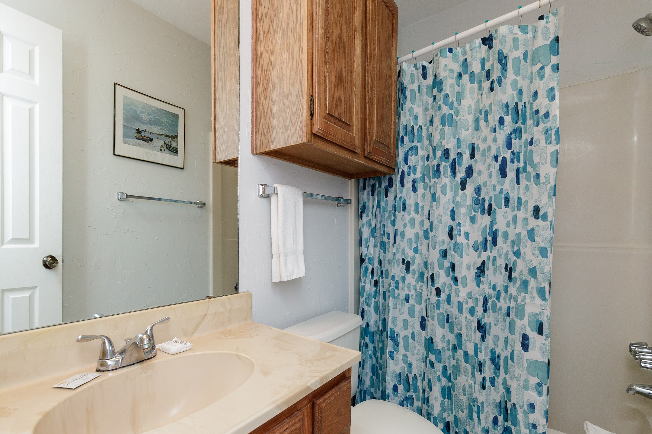Guest bathroom with tub and shower combo