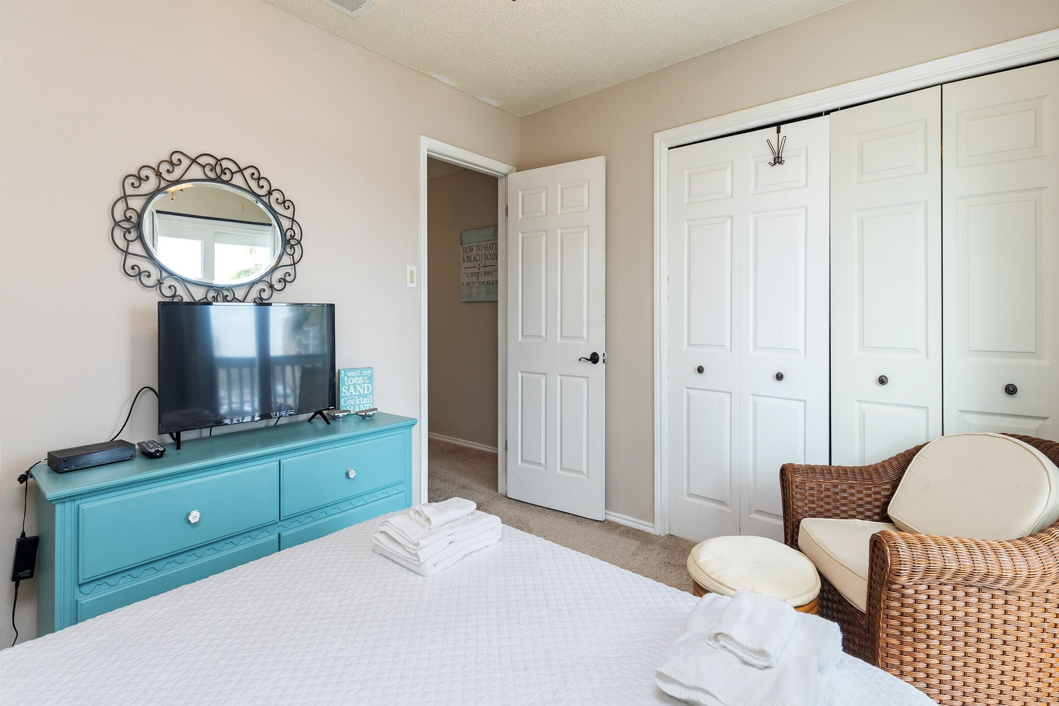 Second bedroom on the second floor with queen size bed, private balcony and flat screen TV