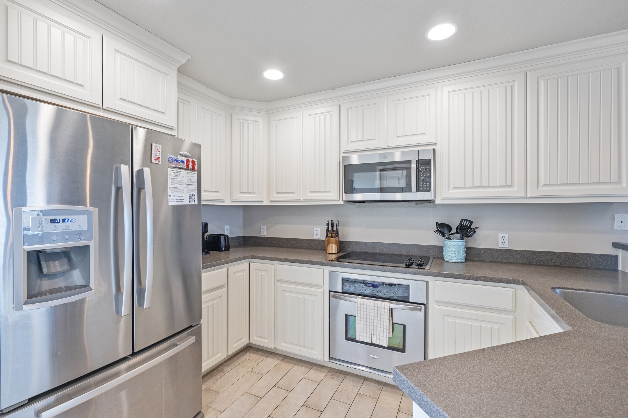 Fully equipped kitchen with updated appliances, plenty of counter space and everything you need to cook
