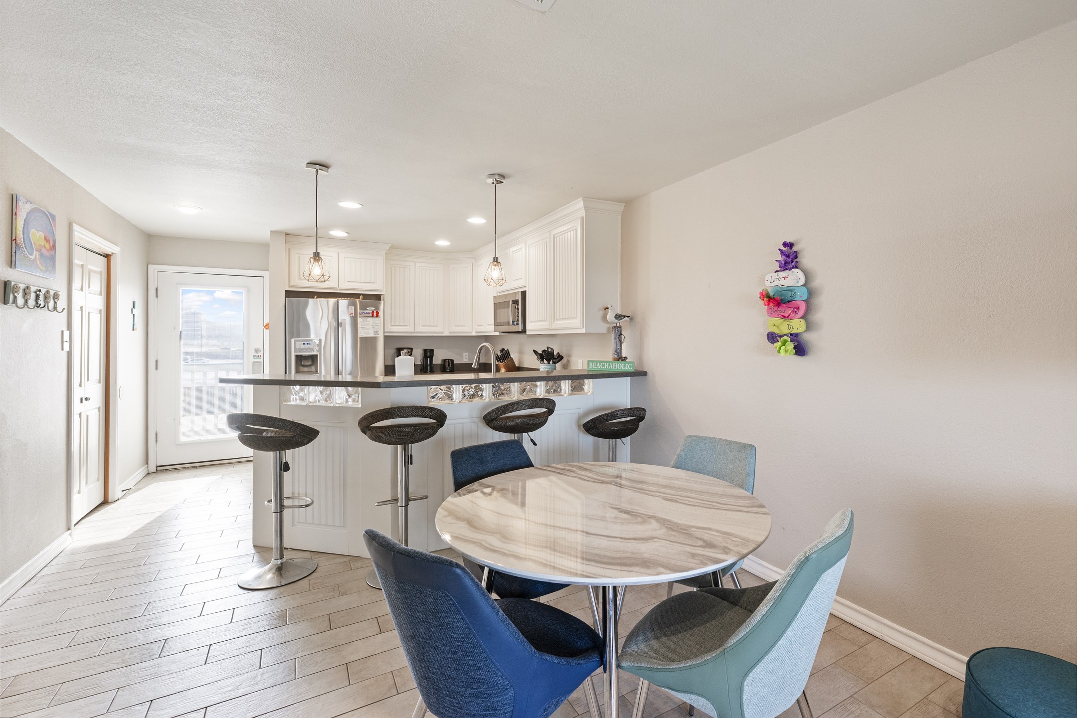 Bright and modern dining and kitchen areas -perfect for preparing family-style meals
